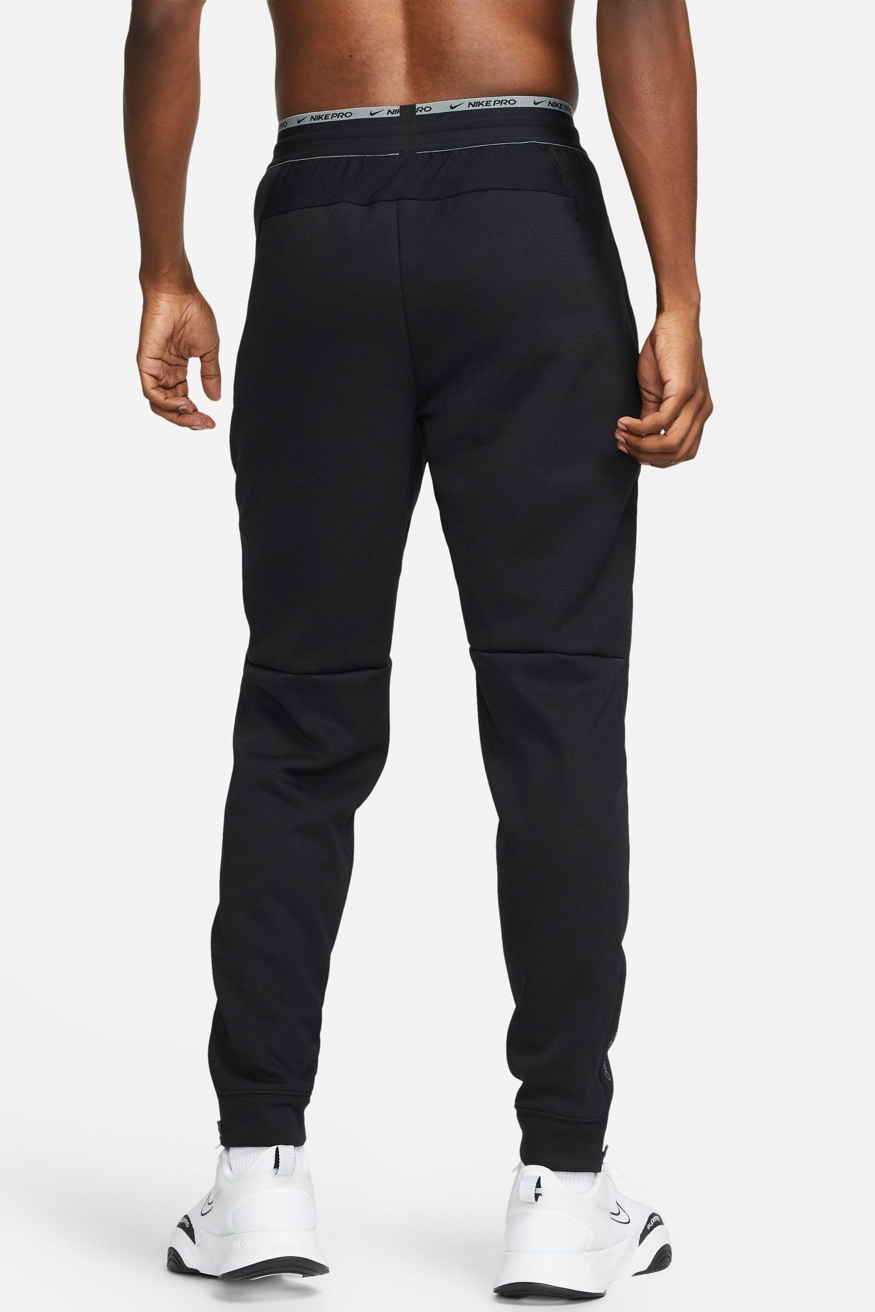 Buy Nike Black Therma Sphere Therma FIT Training Joggers from the