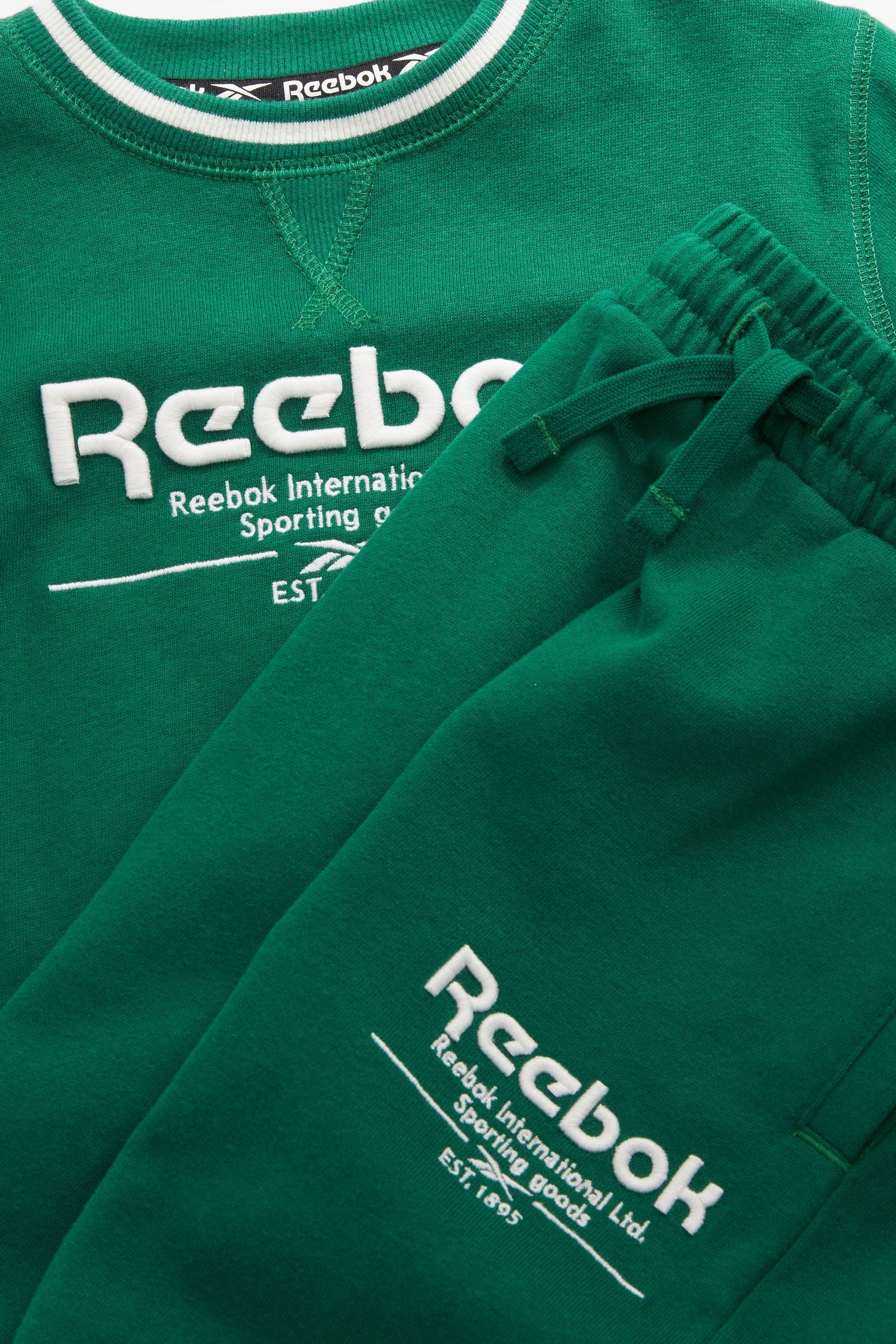 Reebok t online shirt enfant deepblue