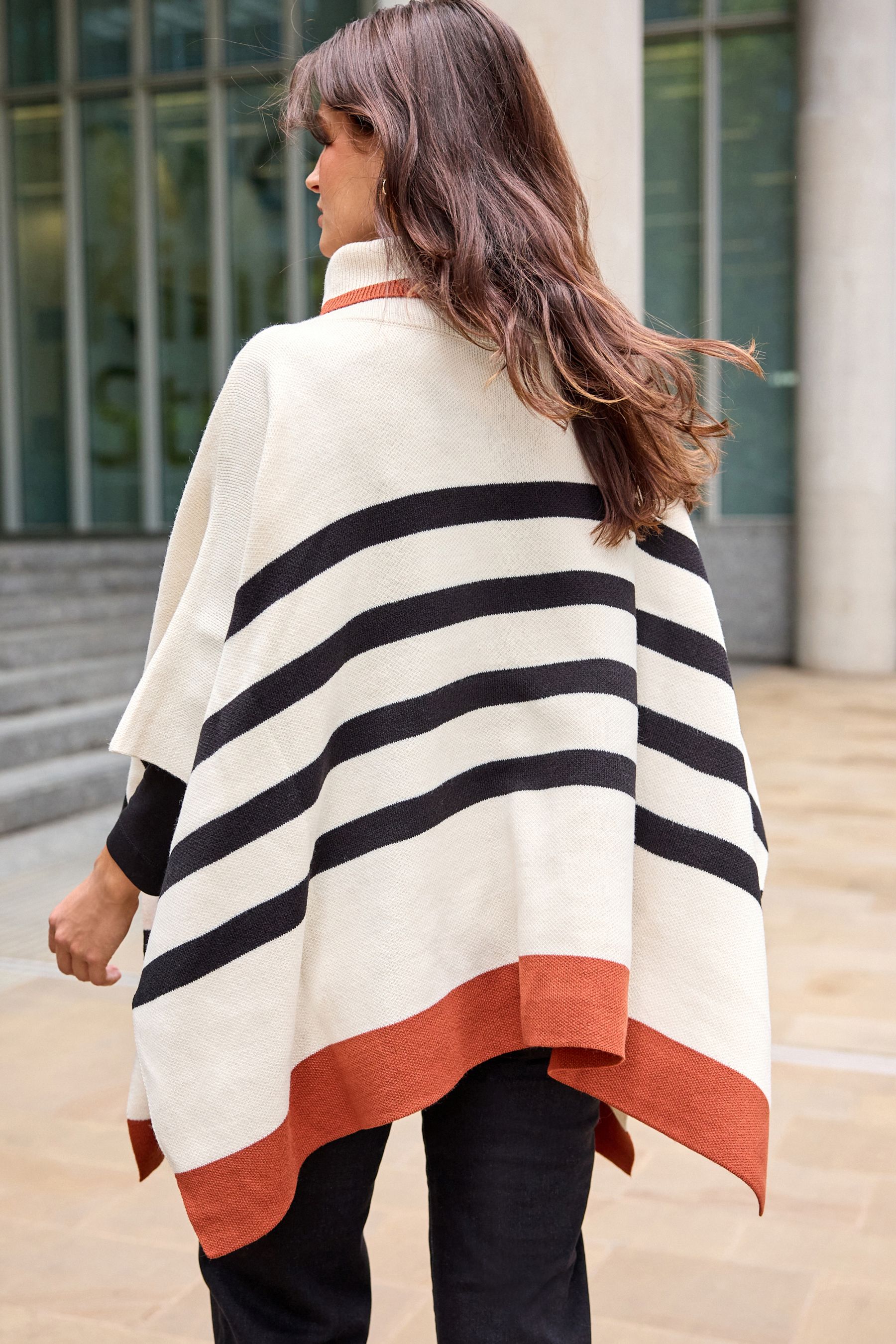 Black poncho jumper 2025