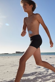 Black Shorter Length Stretch Swim Shorts (3-16yrs) - Image 1 of 4