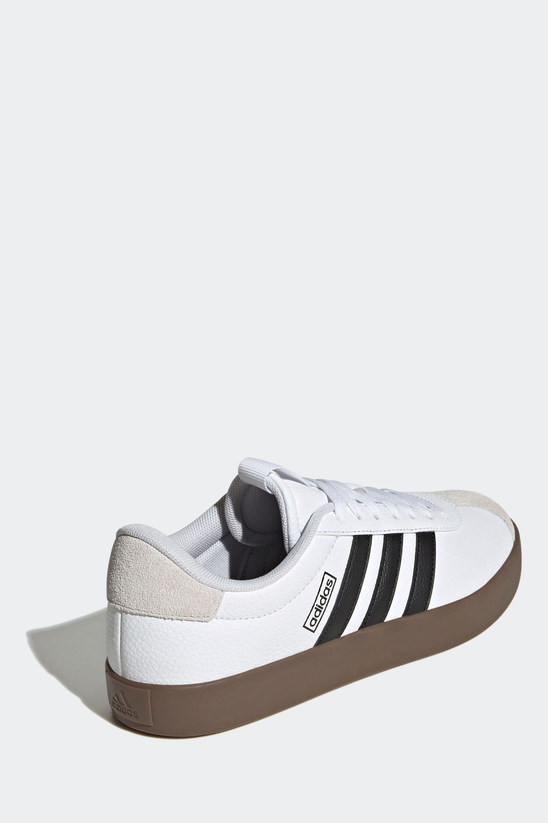 Adidas white trainers with black stripes sales