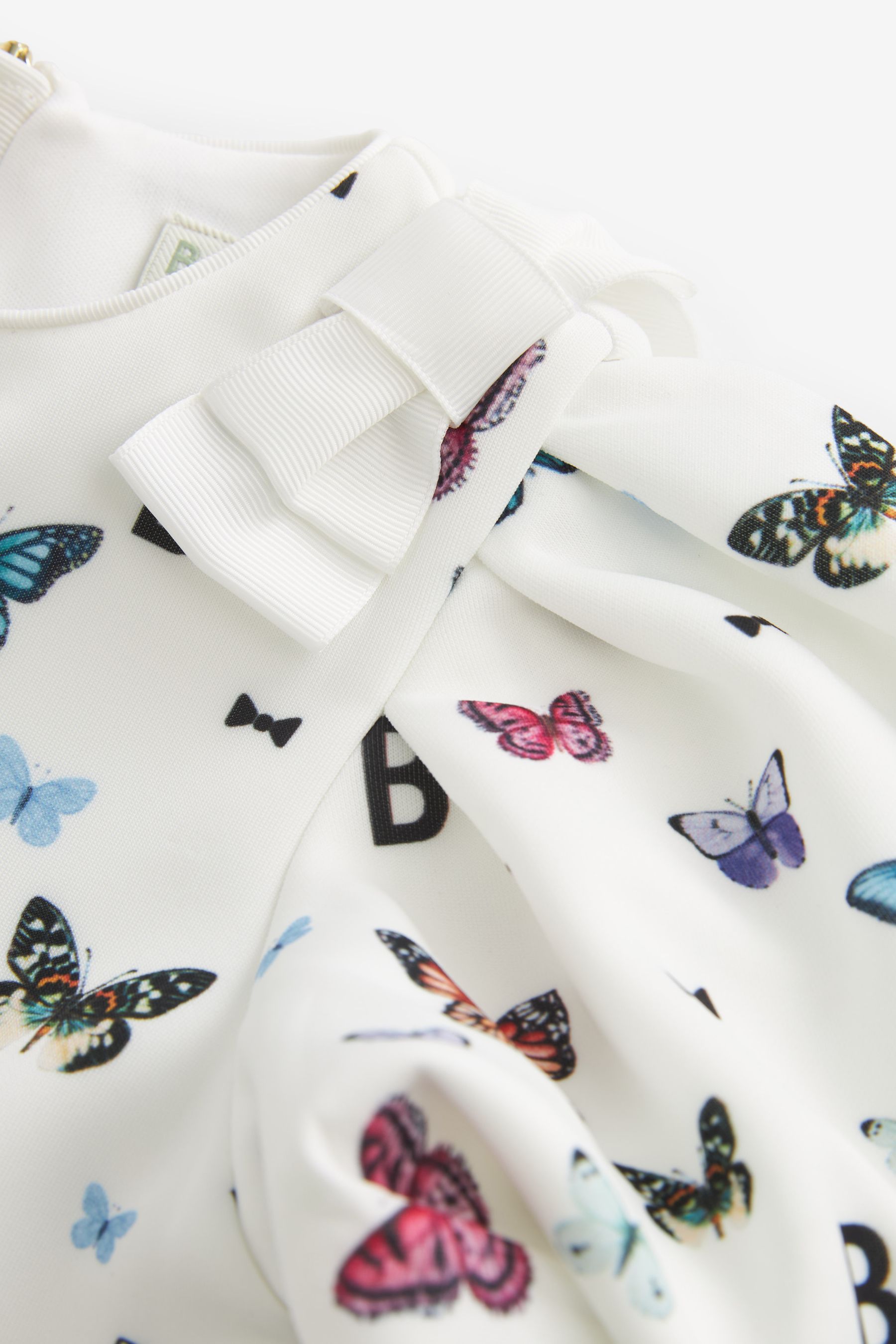 Ted baker butterfly trainers sales