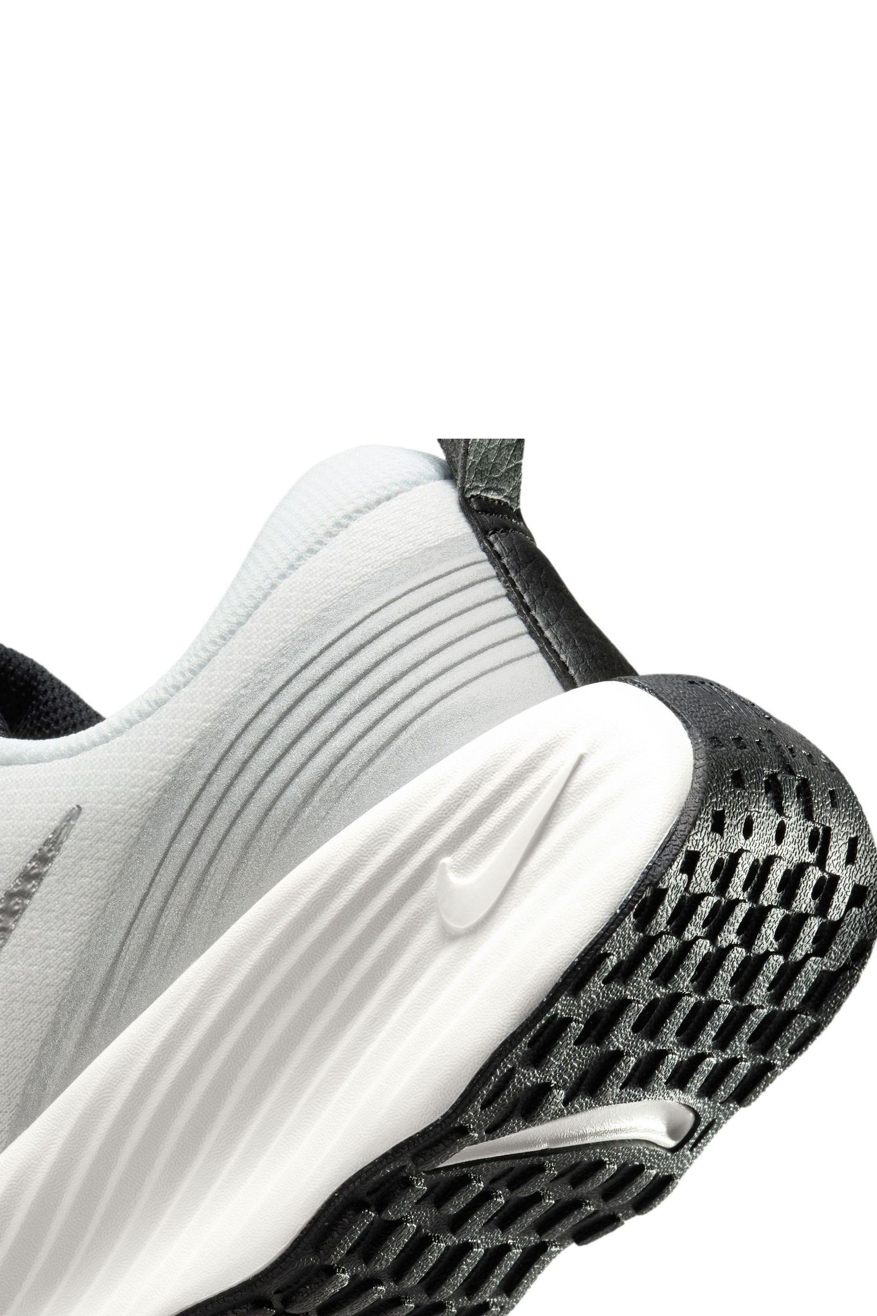 Buy Nike White Silver Promina Walking Trainers from the Next UK online shop