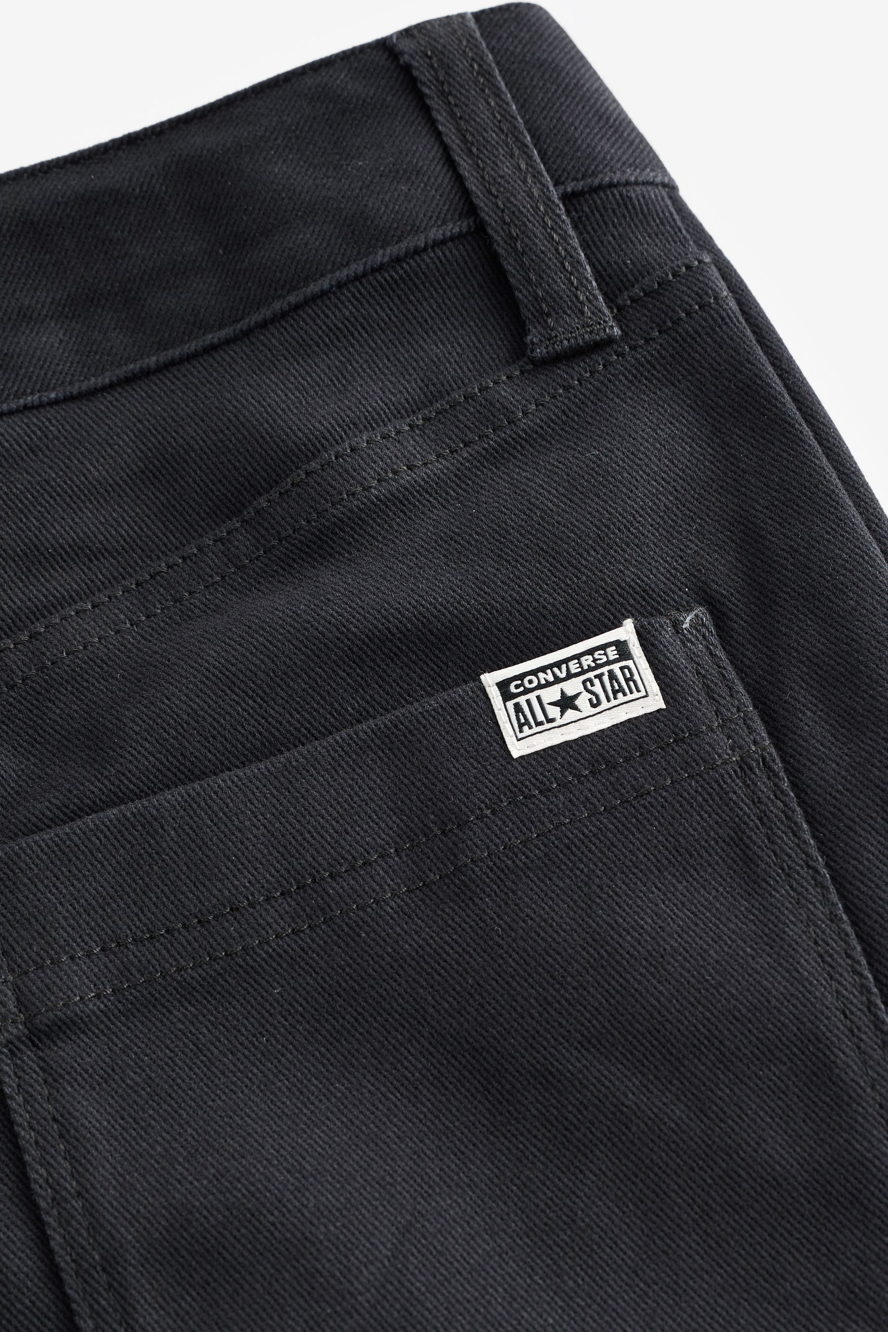 Converse black deals slim