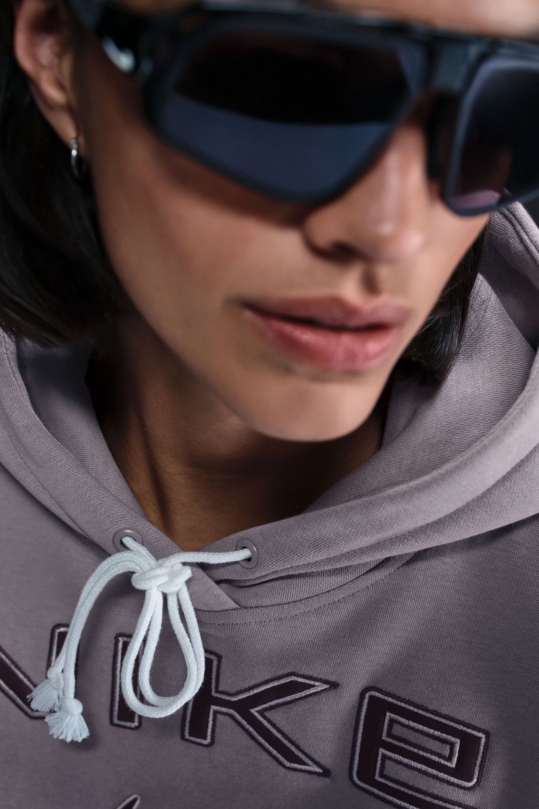 Nike swoosh hoodie lilac top