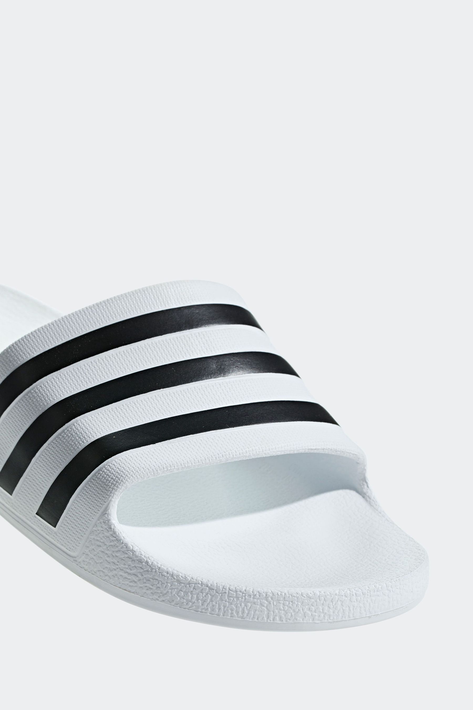 Buy adidas White Sportswear Adilette Aqua Slides from the Next UK online shop