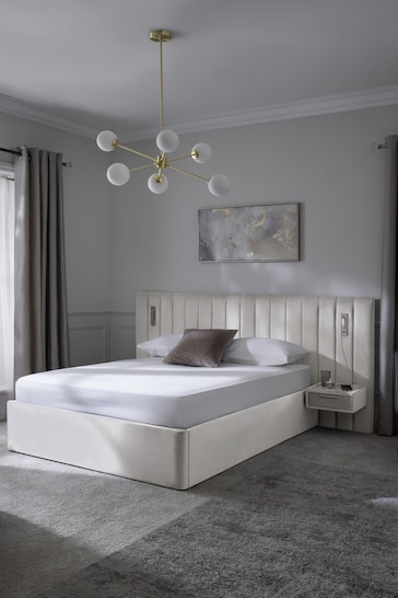 Soft Velvet Natural Oyster Mayfair Upholstered Hotel Bed Frame with Ottoman Storage Bedside Tables and Lights
