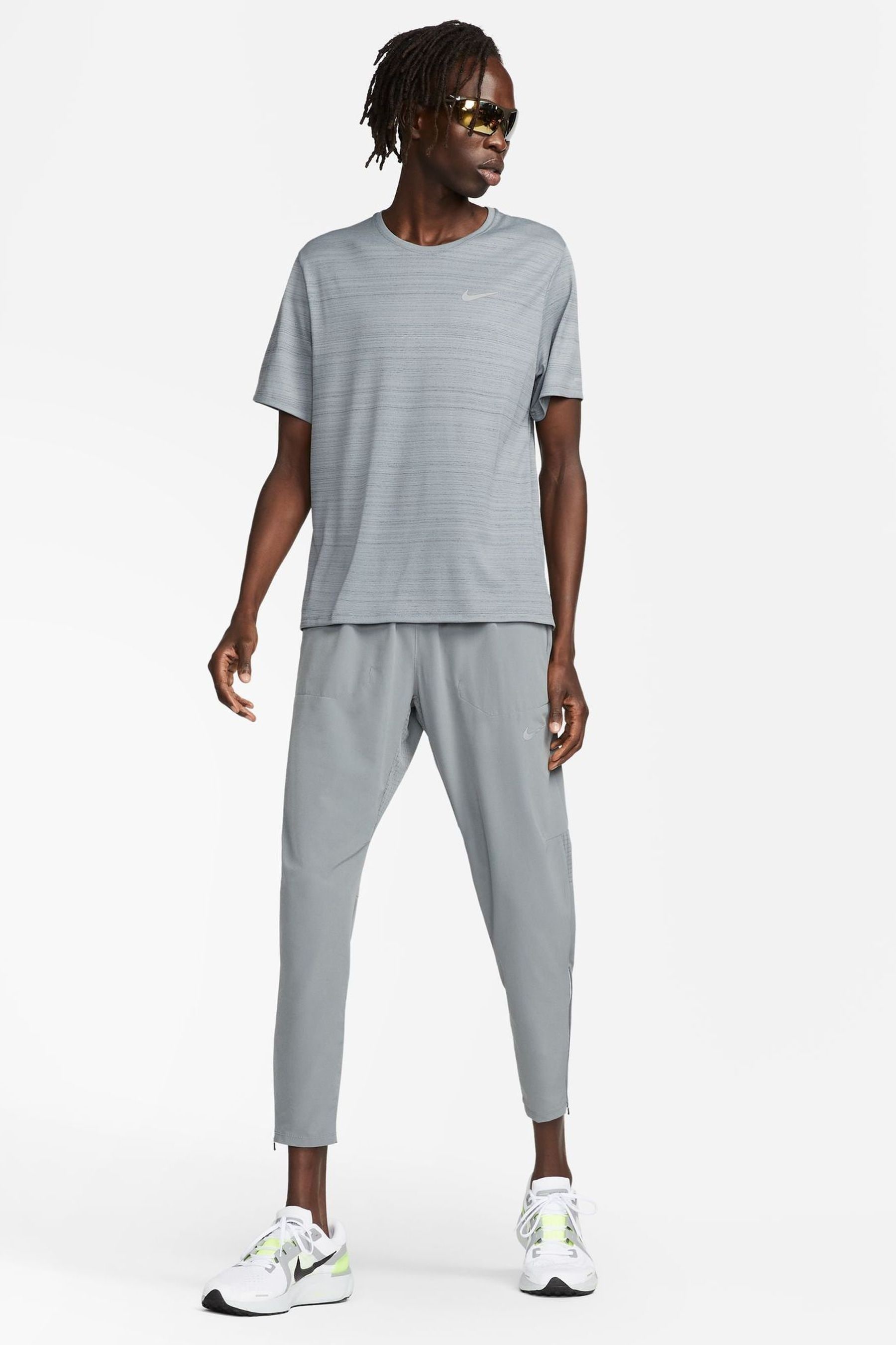 Nike running woven sweatpants best sale