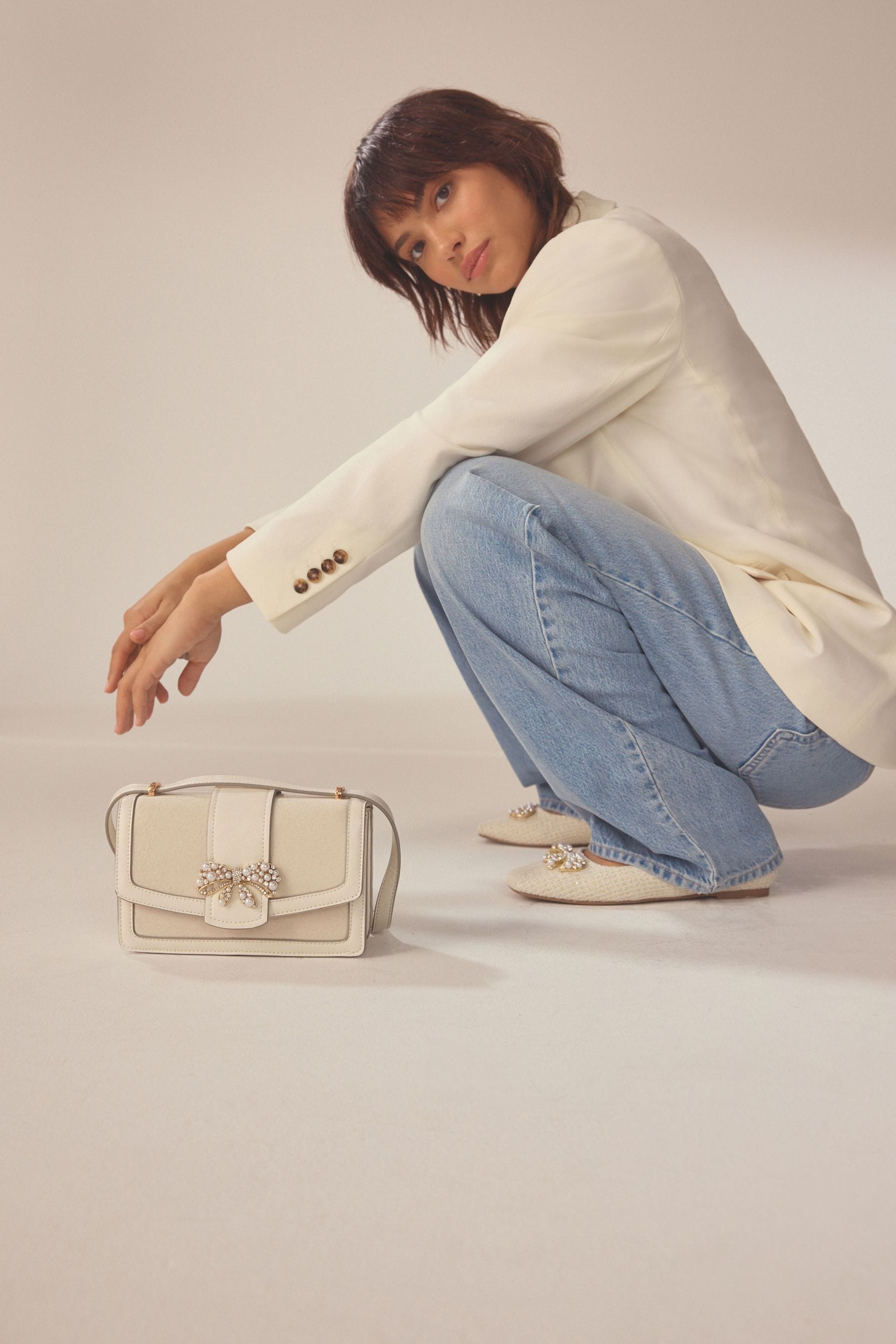 Buy Bone Bow Embellished Cross Body Bag from Next Luxembourg