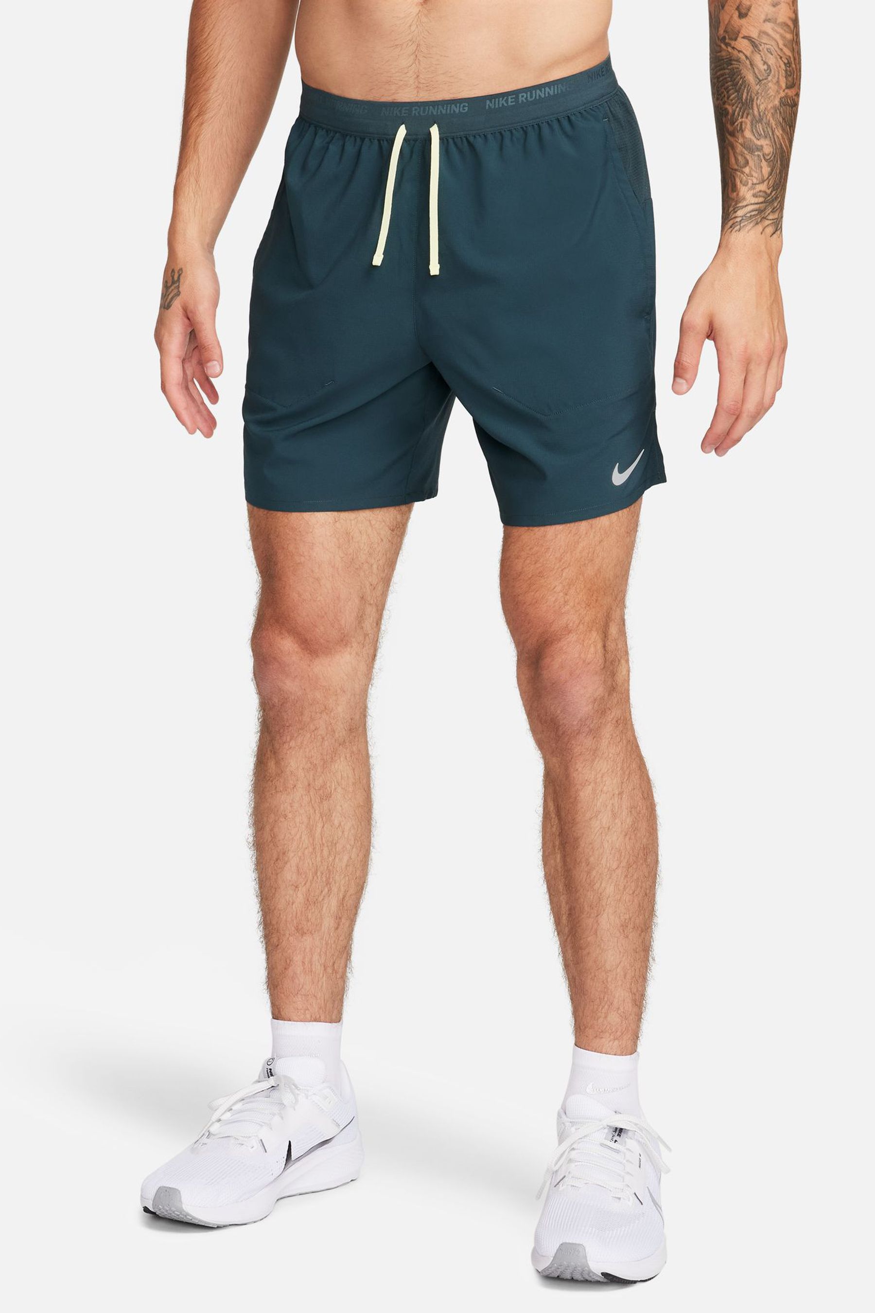 Buy Nike Green Stride 7inch Brief Running Shorts from Next Luxembourg