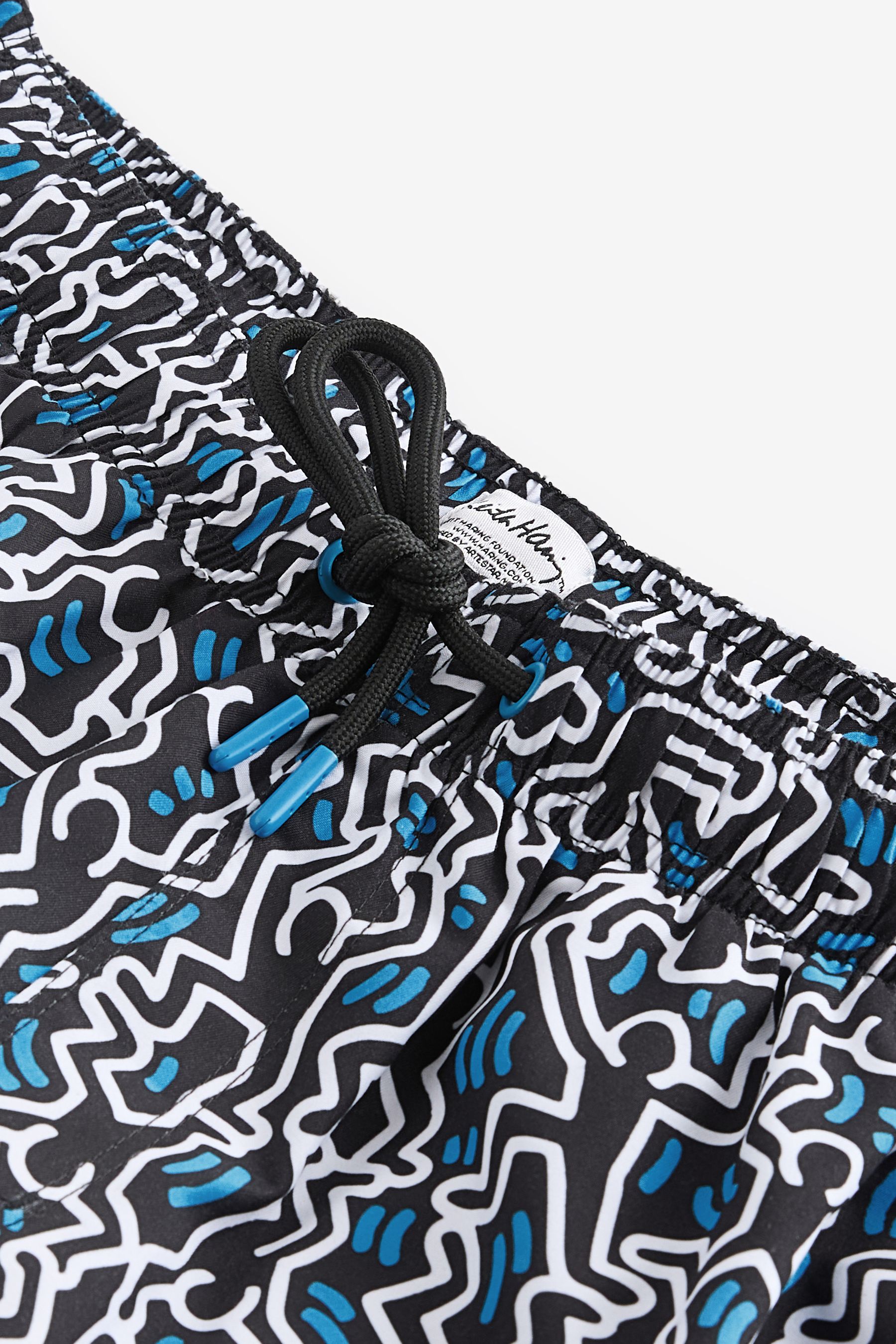 Buy Keith Haring Navy Blue Regular Fit Printed Swim Shorts from the Next UK online shop