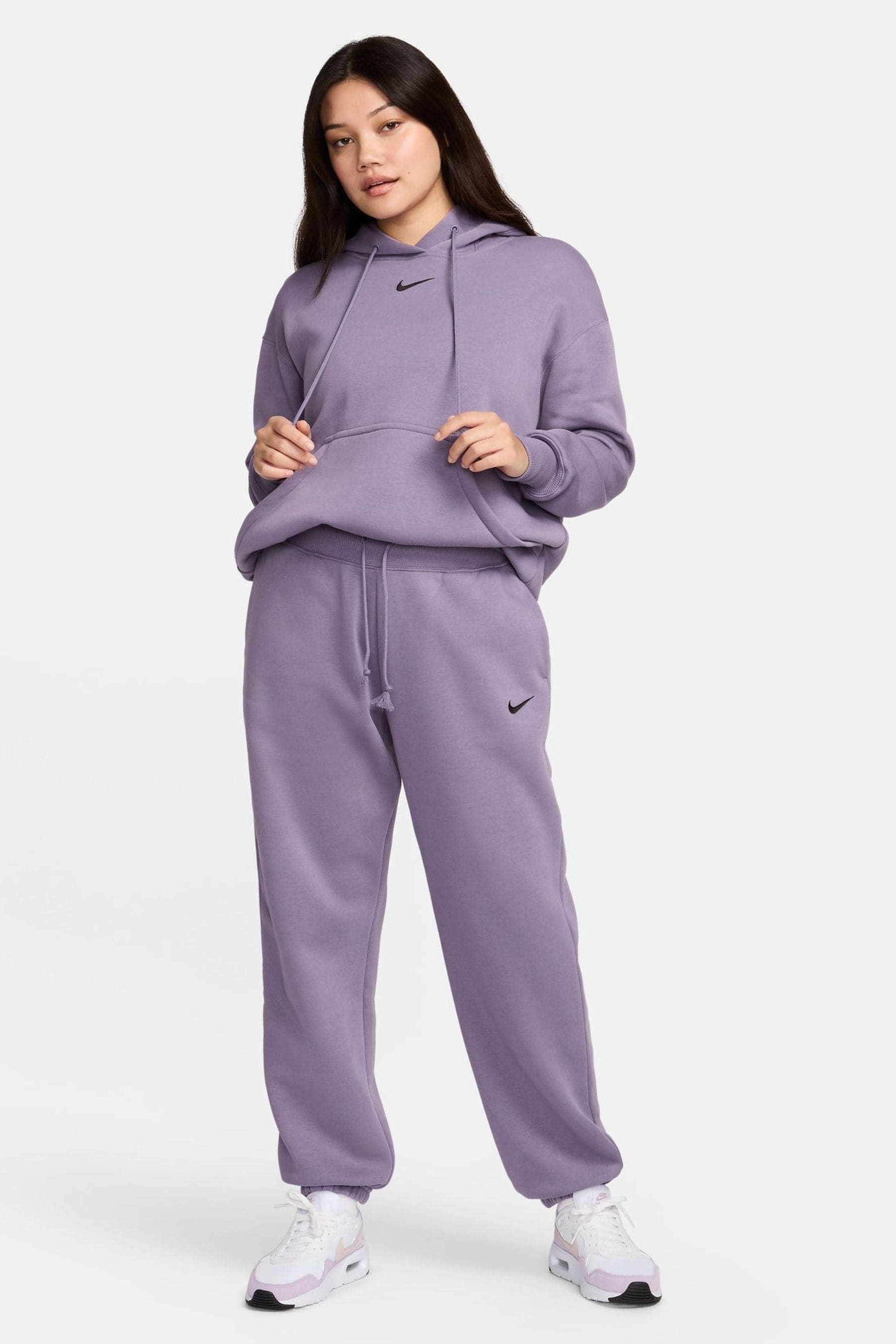 Buy Nike Dark Purple Phoenix Fleece Oversized Mini Swoosh Pullover Hoodie from the Next UK online shop