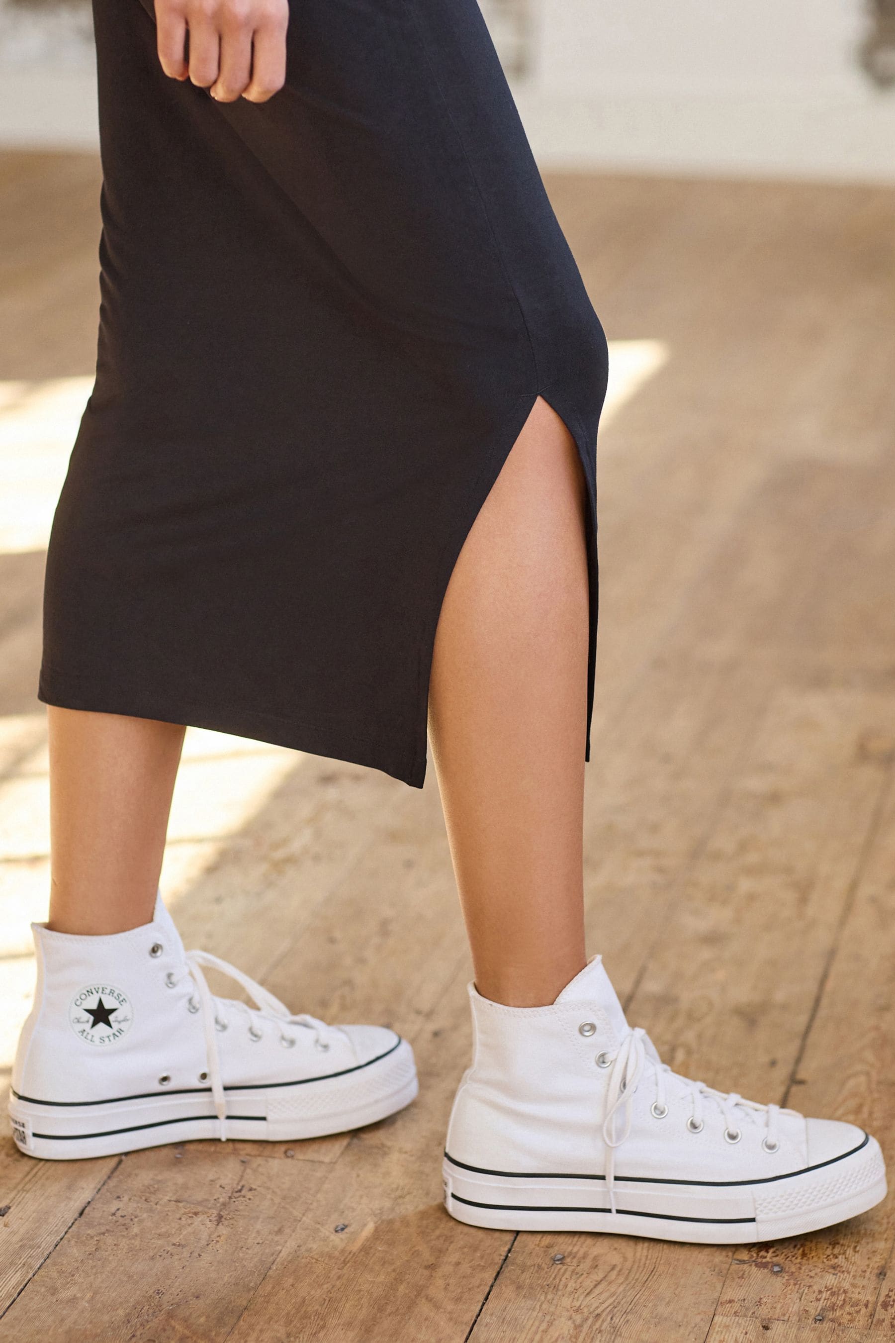 Black jersey midi skirt uk shop