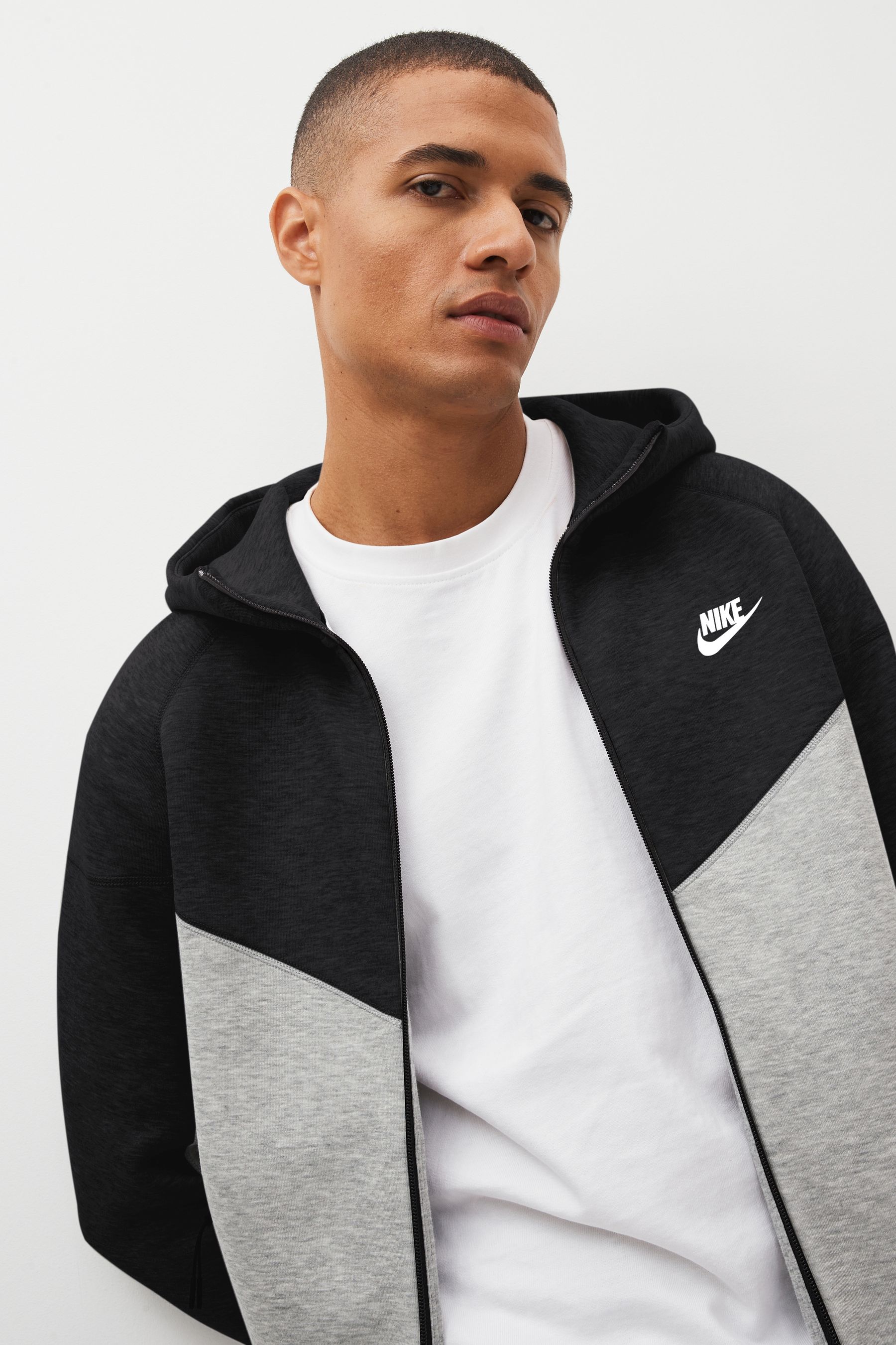 Black and white nike zip up hot sale