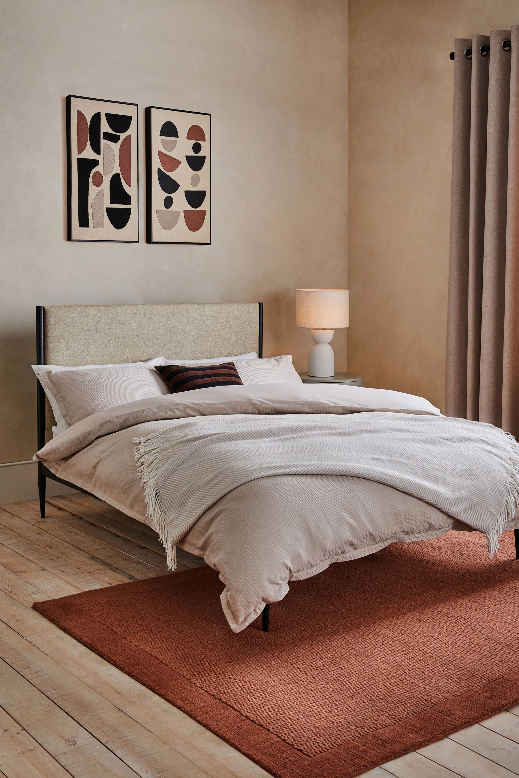 Metal frame upholstered outlet bed
