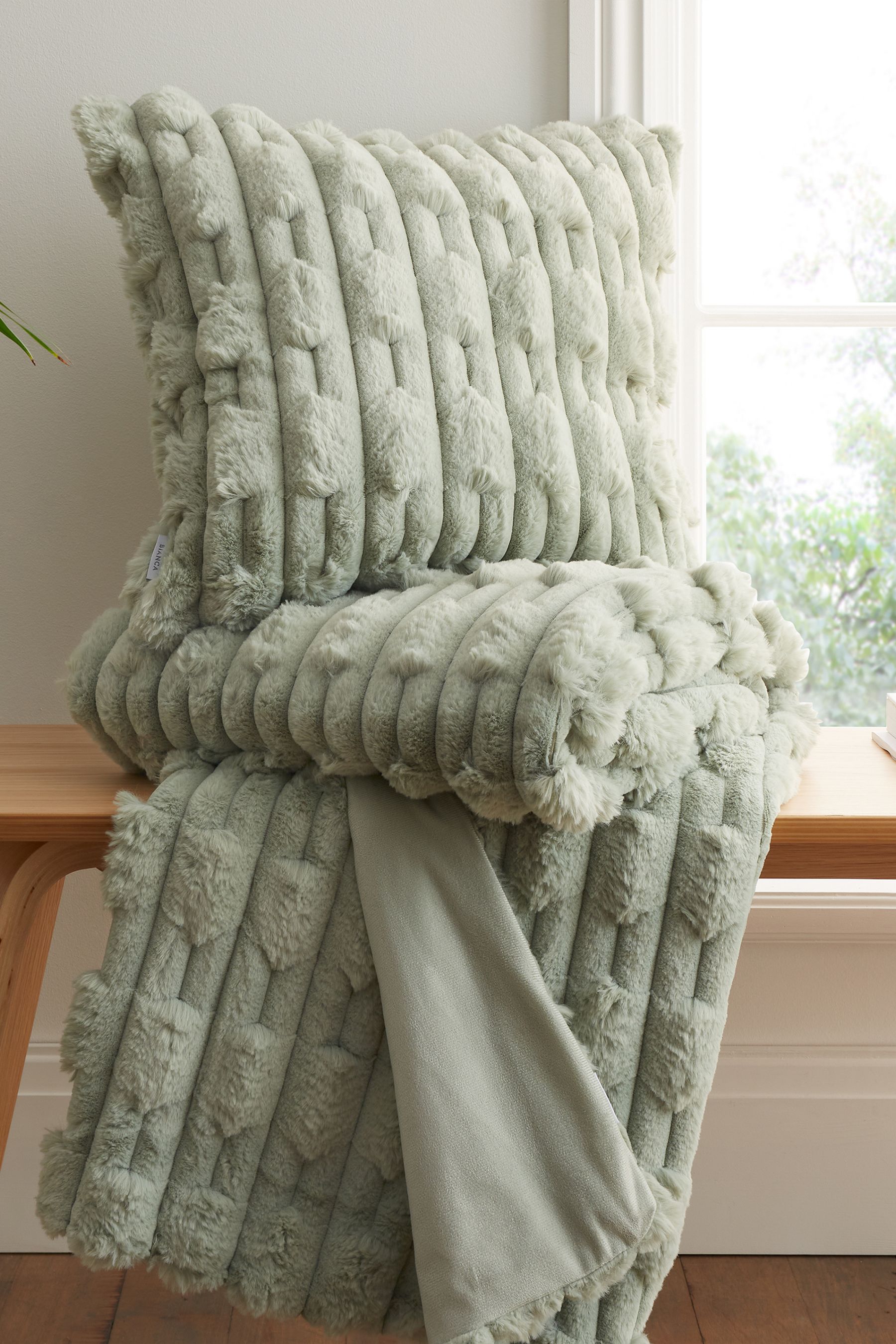 Buy Green Soft and Cosy Carved Faux Fur 100 Cotton Throw from the Next UK online shop