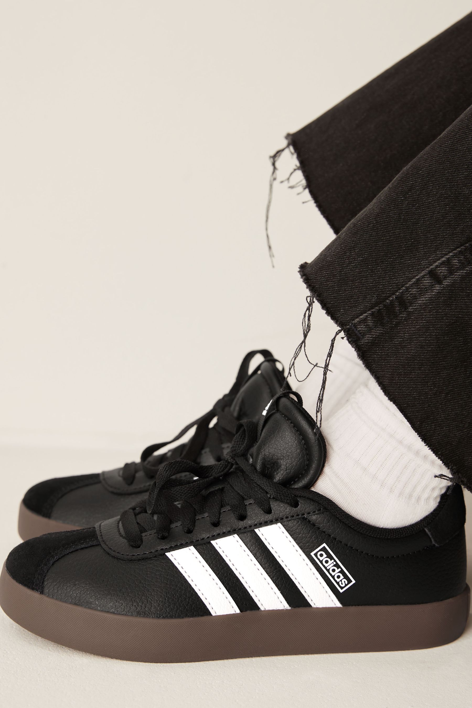 Tan and black adidas hot sale