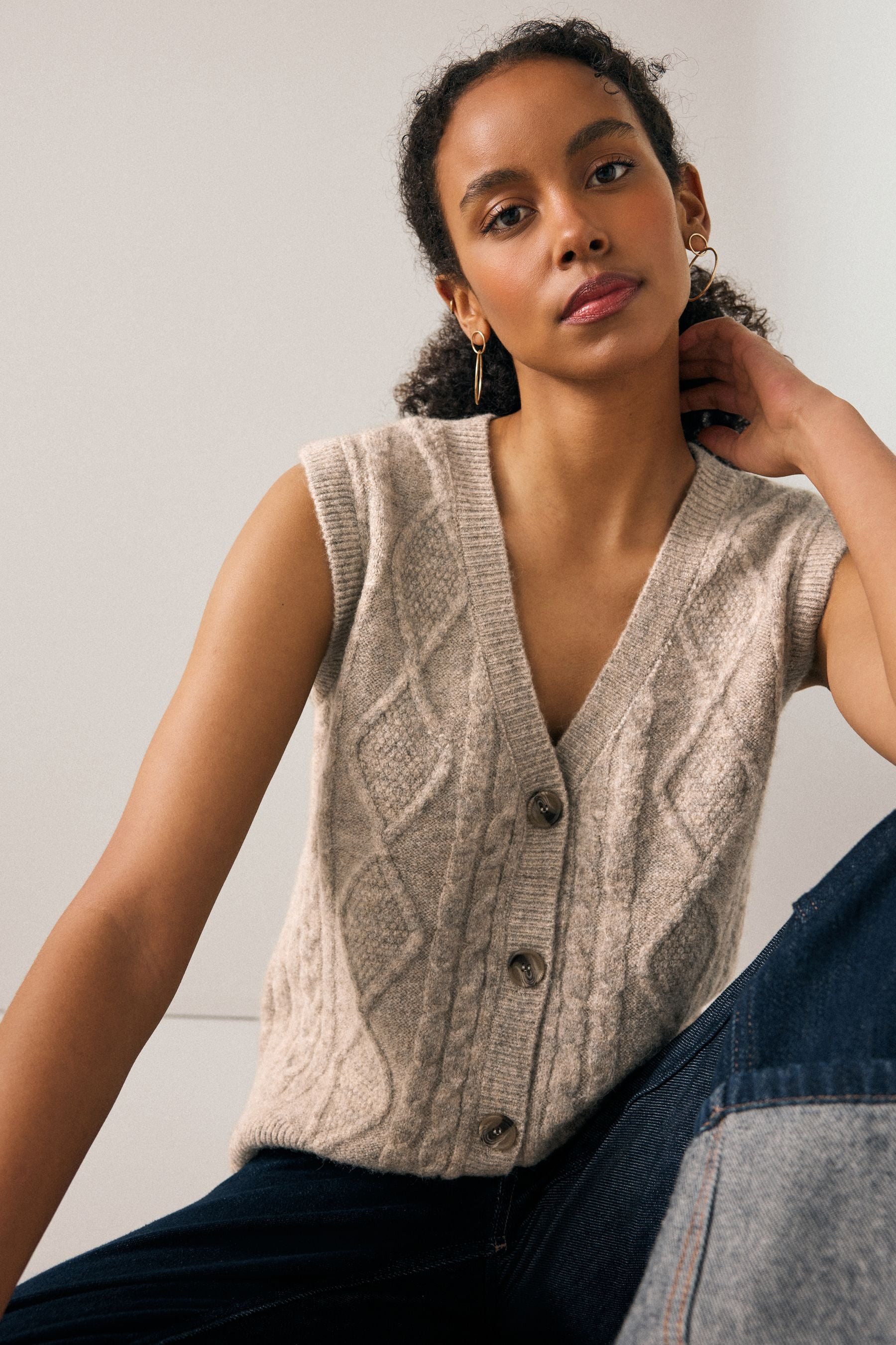 Buy Ecru Cream Sleeveless Button Through Cable Knitted Waistcoat from the Next UK online shop