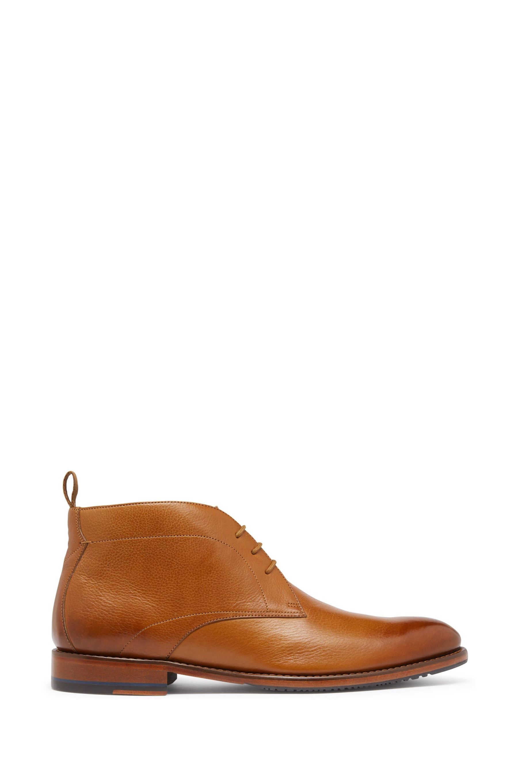 Light tan leather boots top