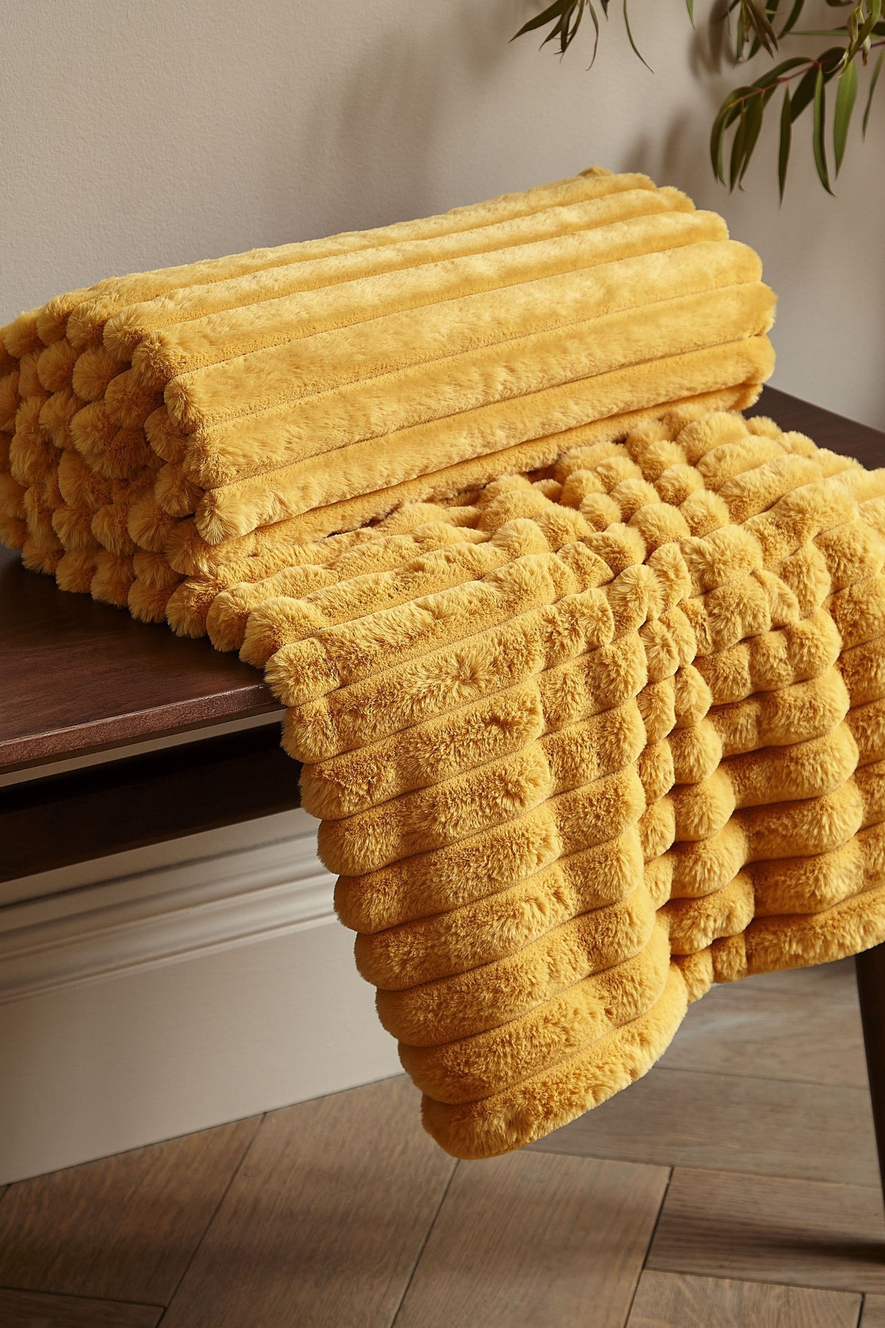 Buy Catherine Lansfield Yellow Soft and Cosy Ribbed Faux Fur Throw from the Next UK online shop