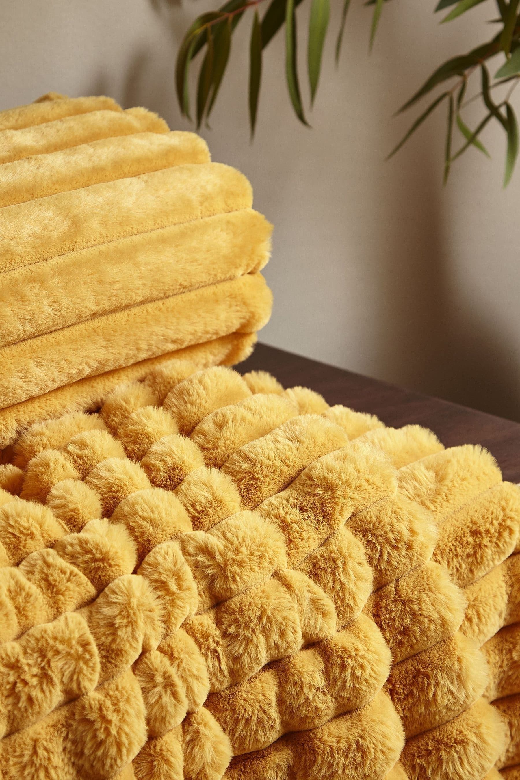 Buy Catherine Lansfield Yellow Soft and Cosy Ribbed Faux Fur Throw from the Next UK online shop