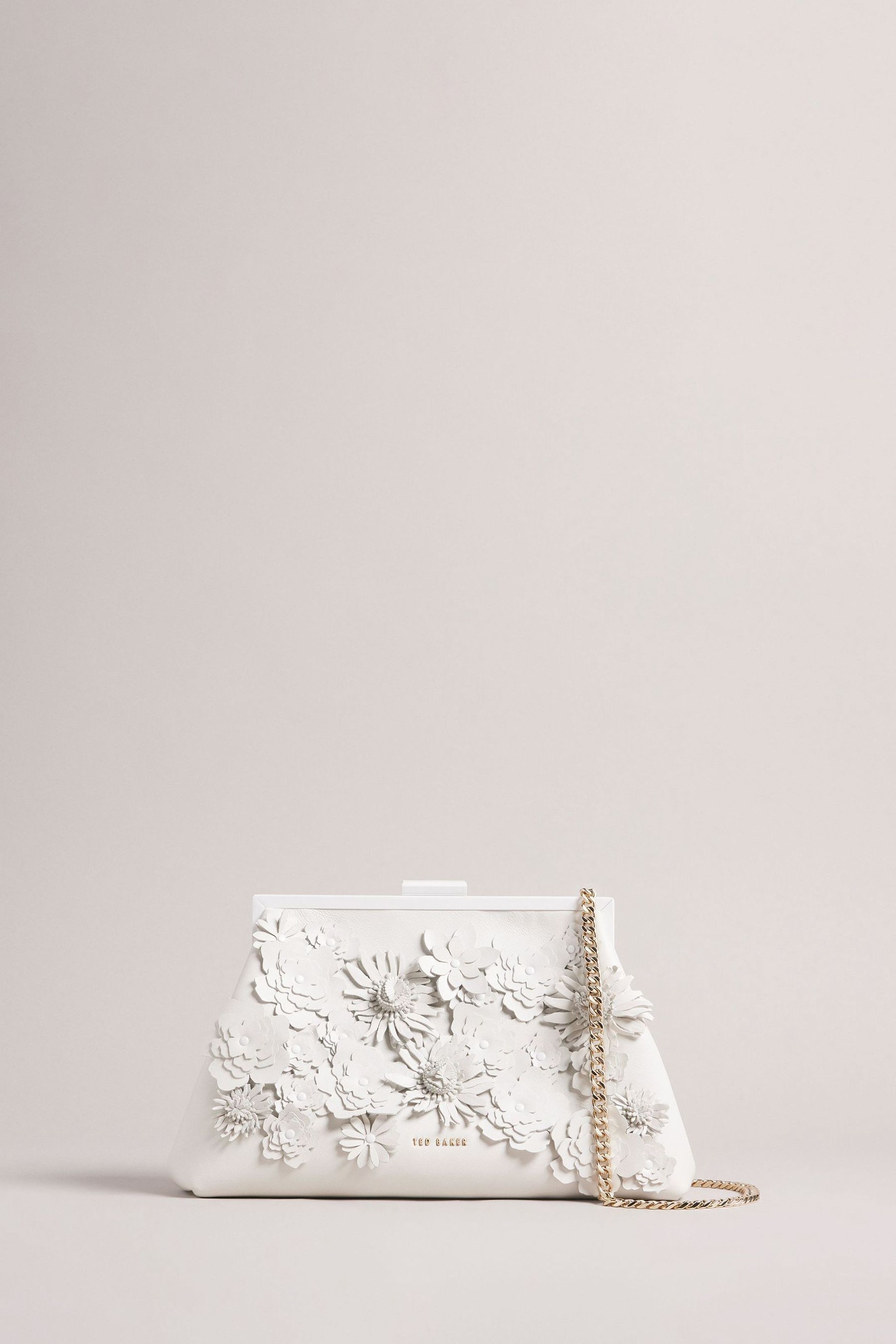 Buy Ted Baker Cream Felorr Applique Flower Clutch Bag from Next Germany