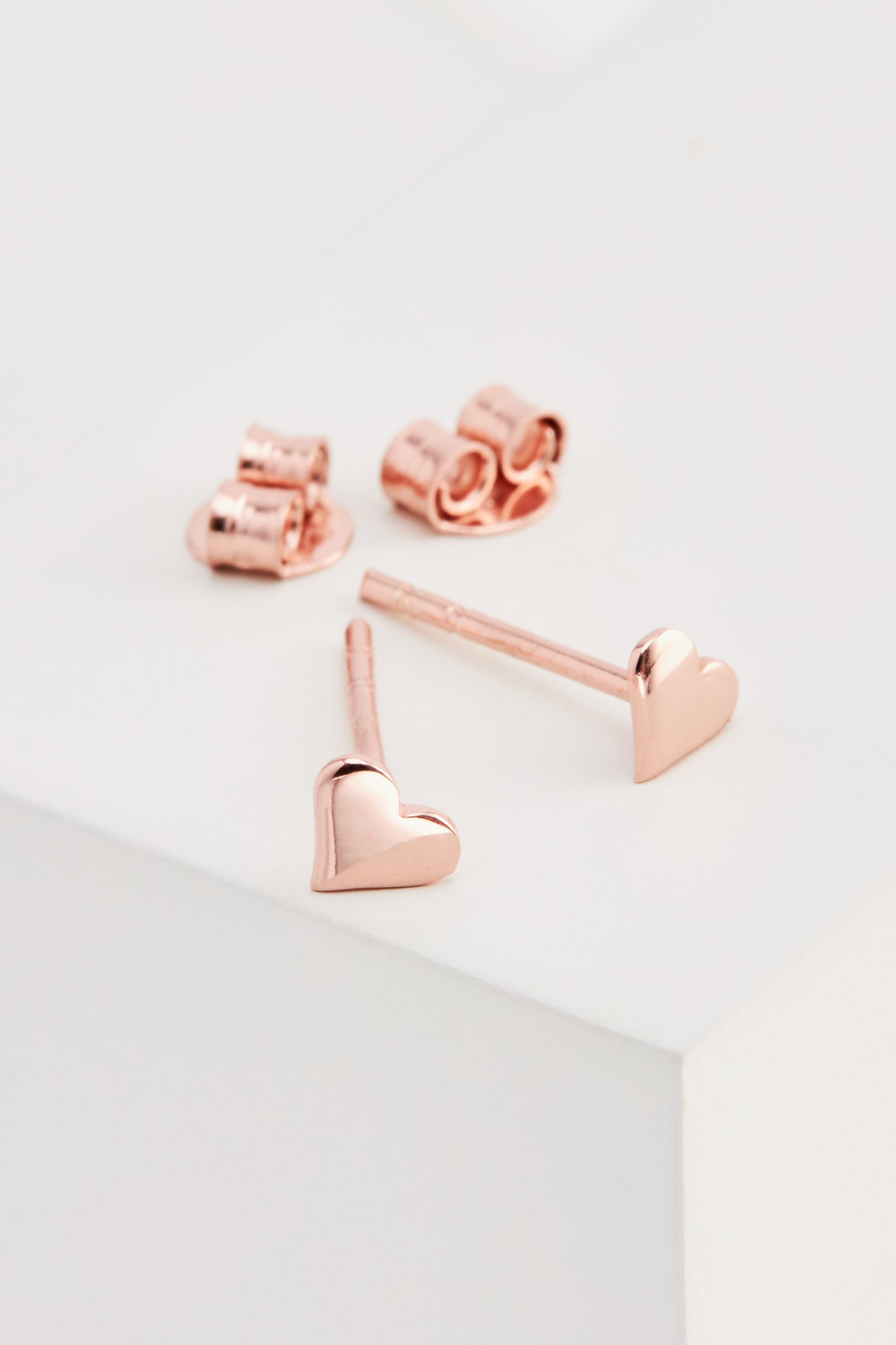 Buy Rose Gold Plated Sterling Silver Heart Stud Earrings from the Next UK online shop