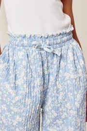 Blue/ White Floral Print Crinkle Texture Jersey Wide Leg Trousers (3-16yrs) - Image 3 of 6