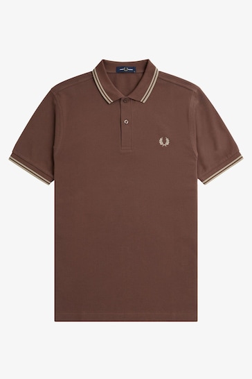 Classic style polo top with stand-up collar and quarter zippered front placket