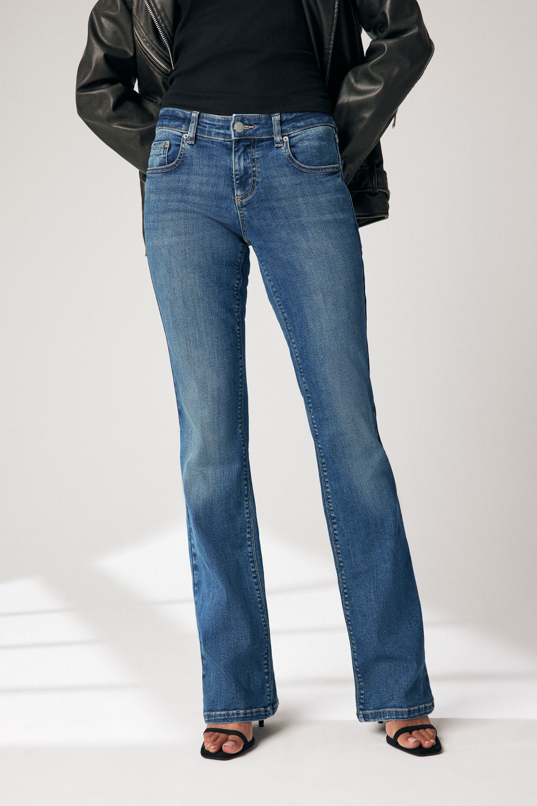 Buy Dark Blue Low Bootcut Jeans from Next Luxembourg