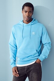 adidas originals Blue 100% Cotton Trefoil Essentials Hoodie - Image 1 of 7