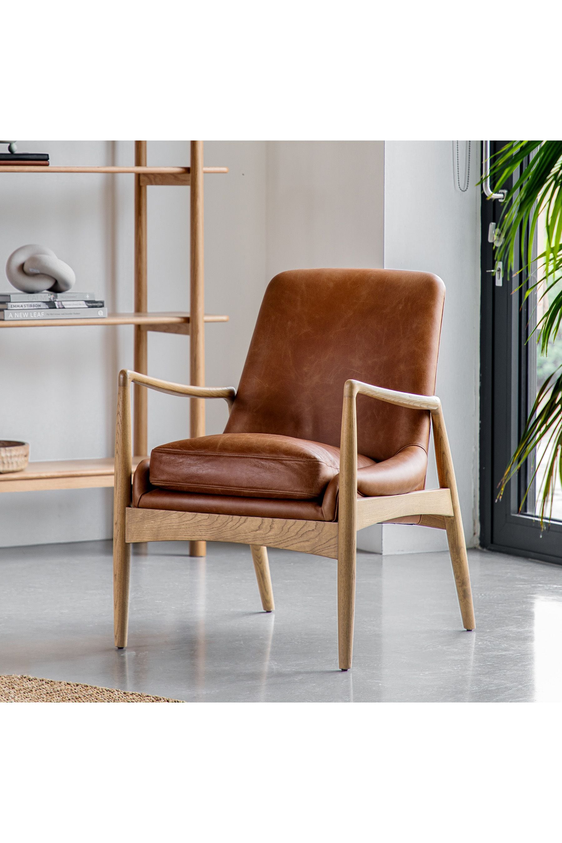 Brown leather outlet armchair next