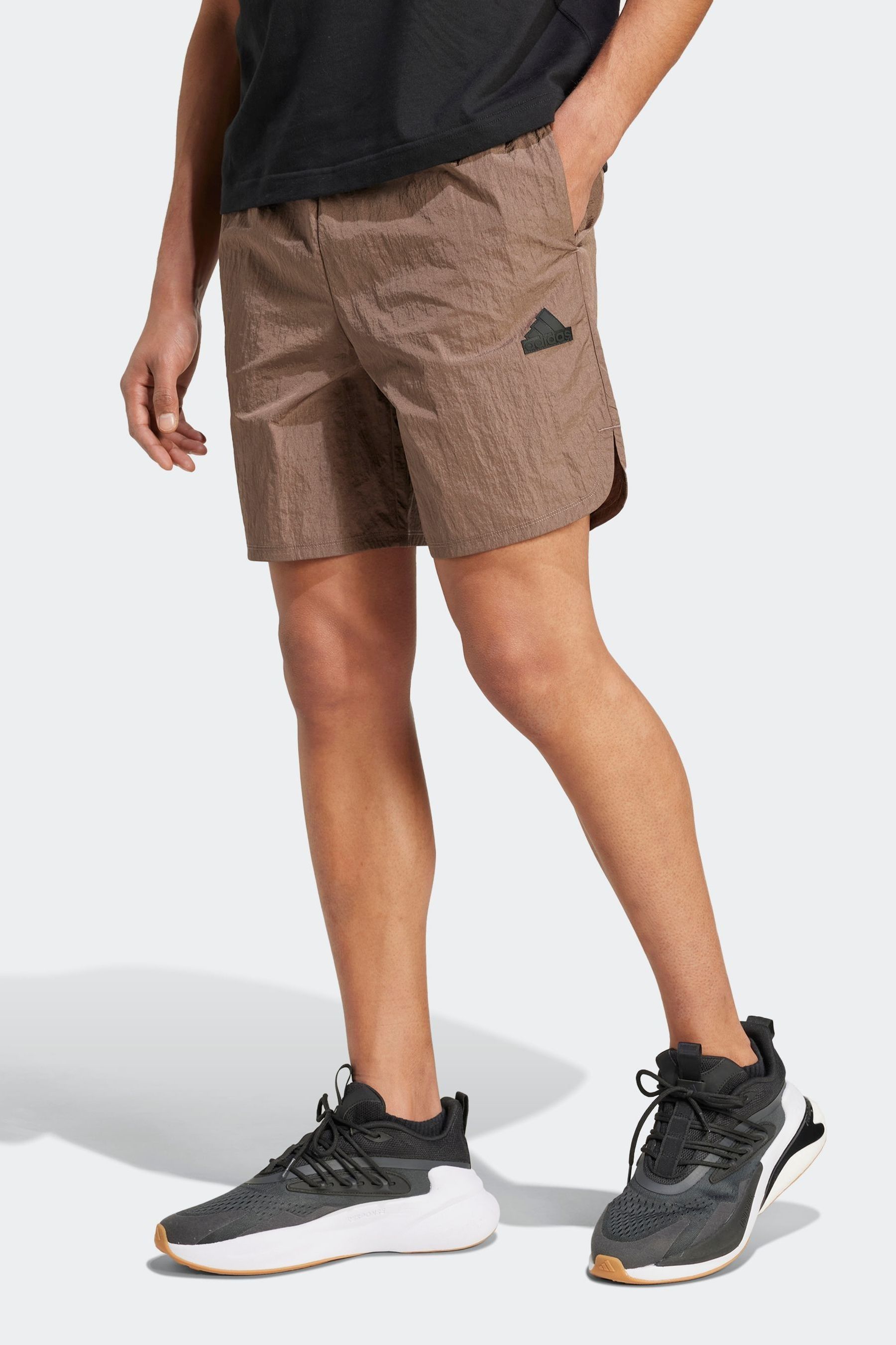 Brown adidas shorts sales