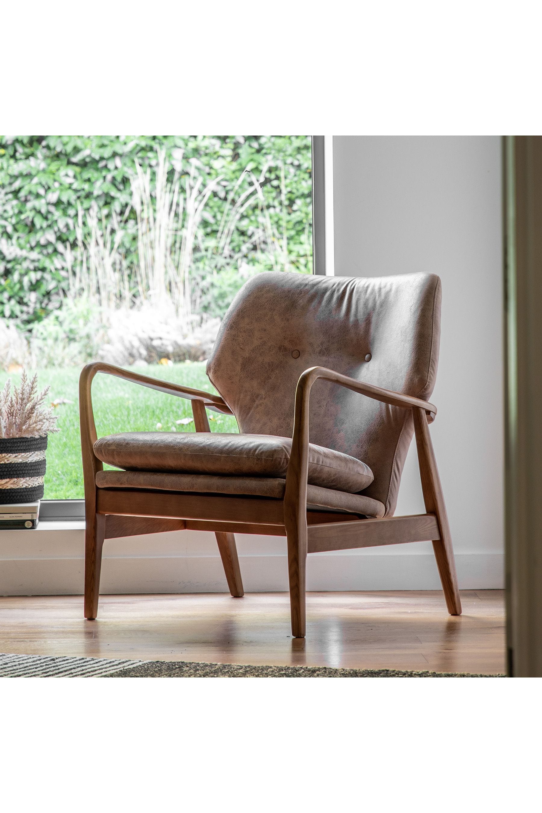 Brown leather outlet armchair next