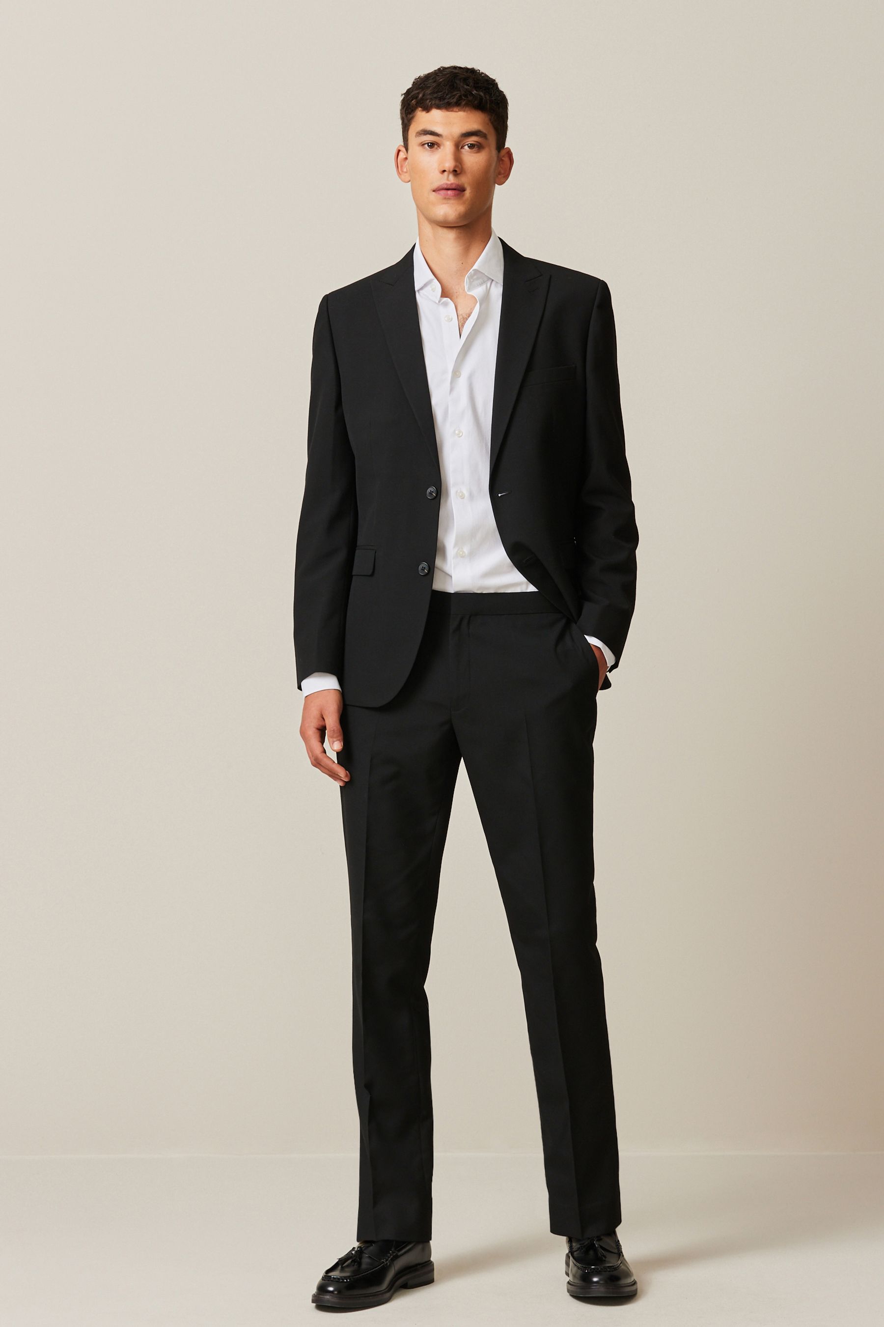 Buy Black Slim Fit Suit Trousers With Side Adjuster from the Next UK online shop