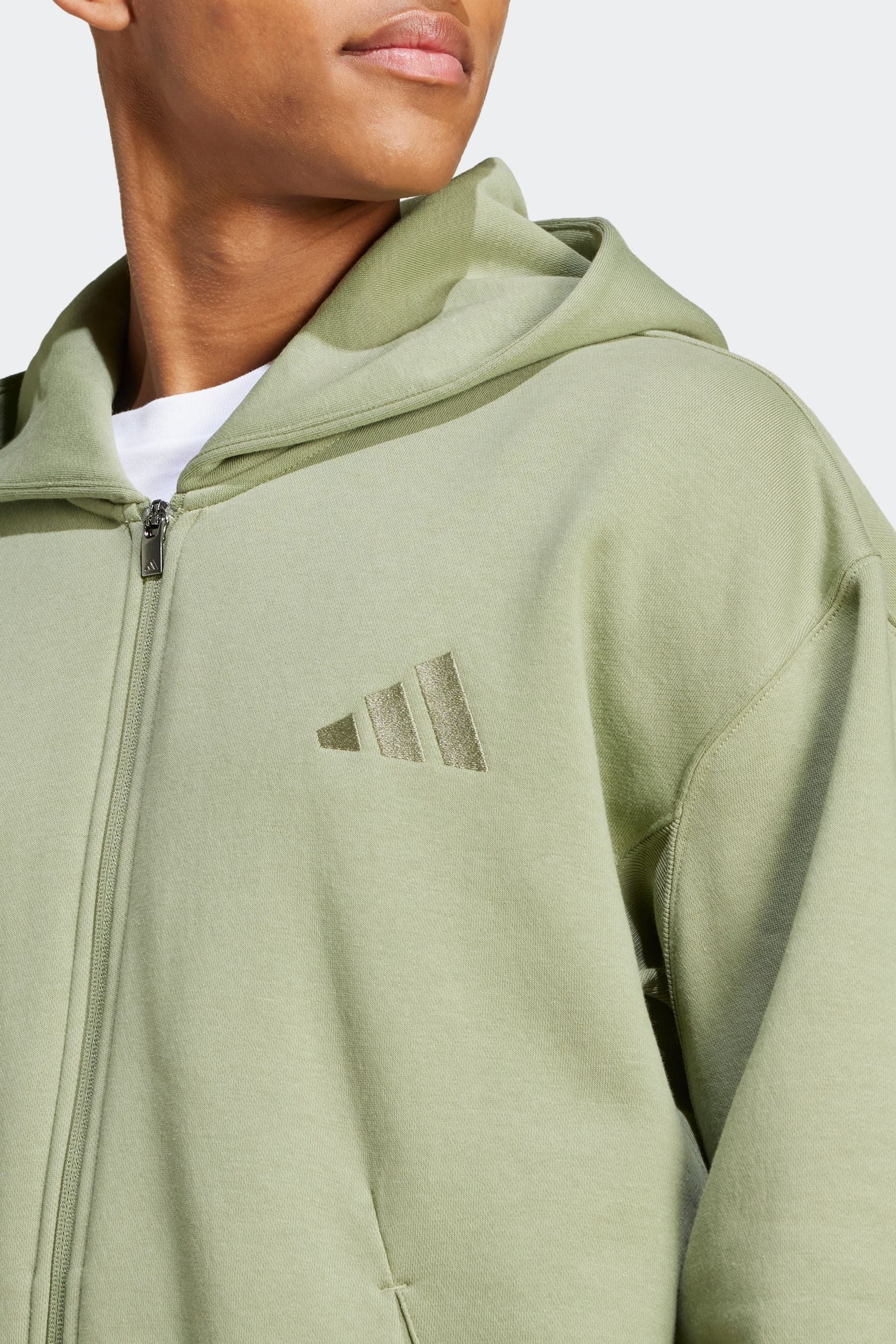 Adidas olive green hoodie 2025