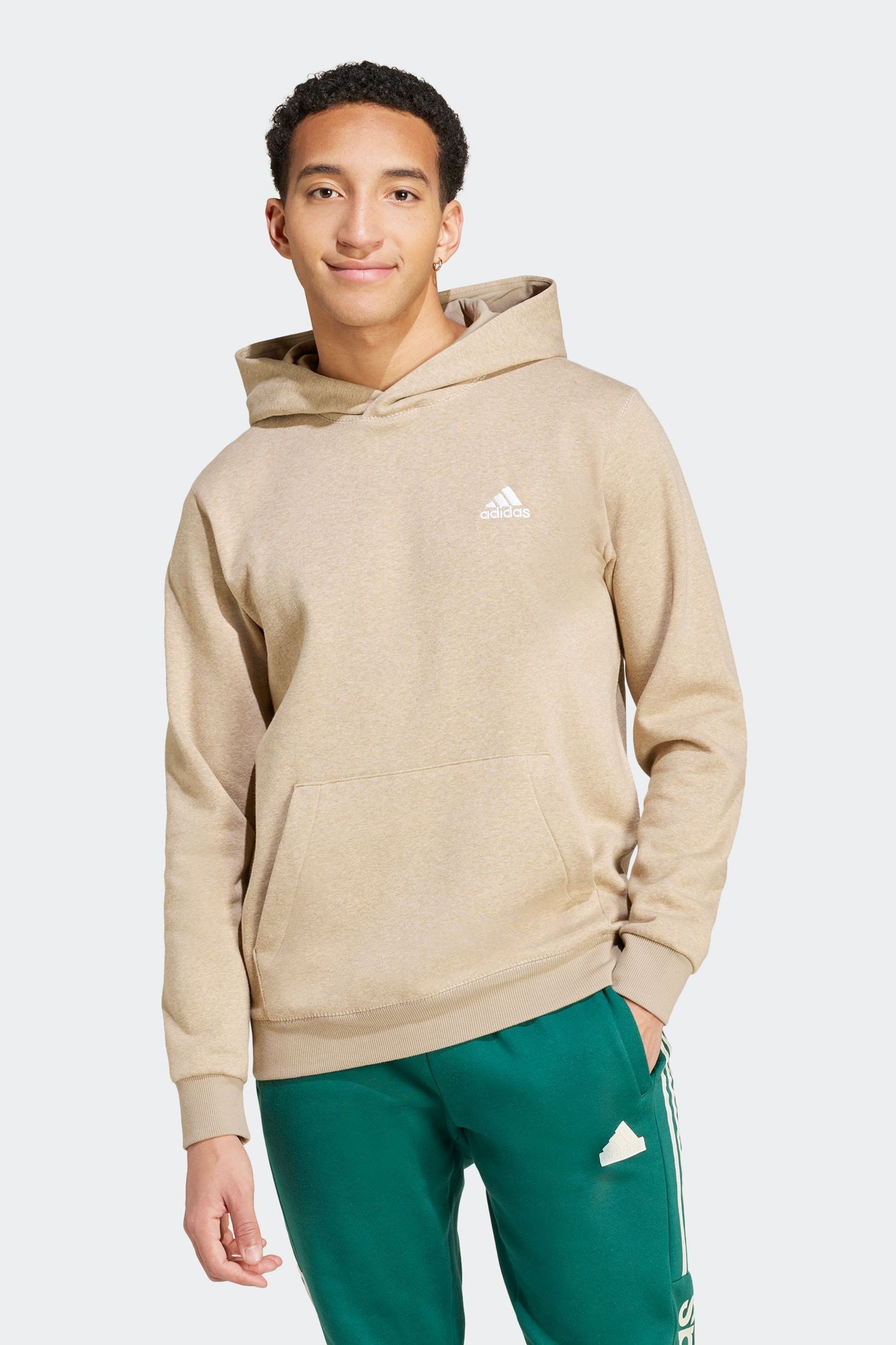 Light pink adidas hoodie top