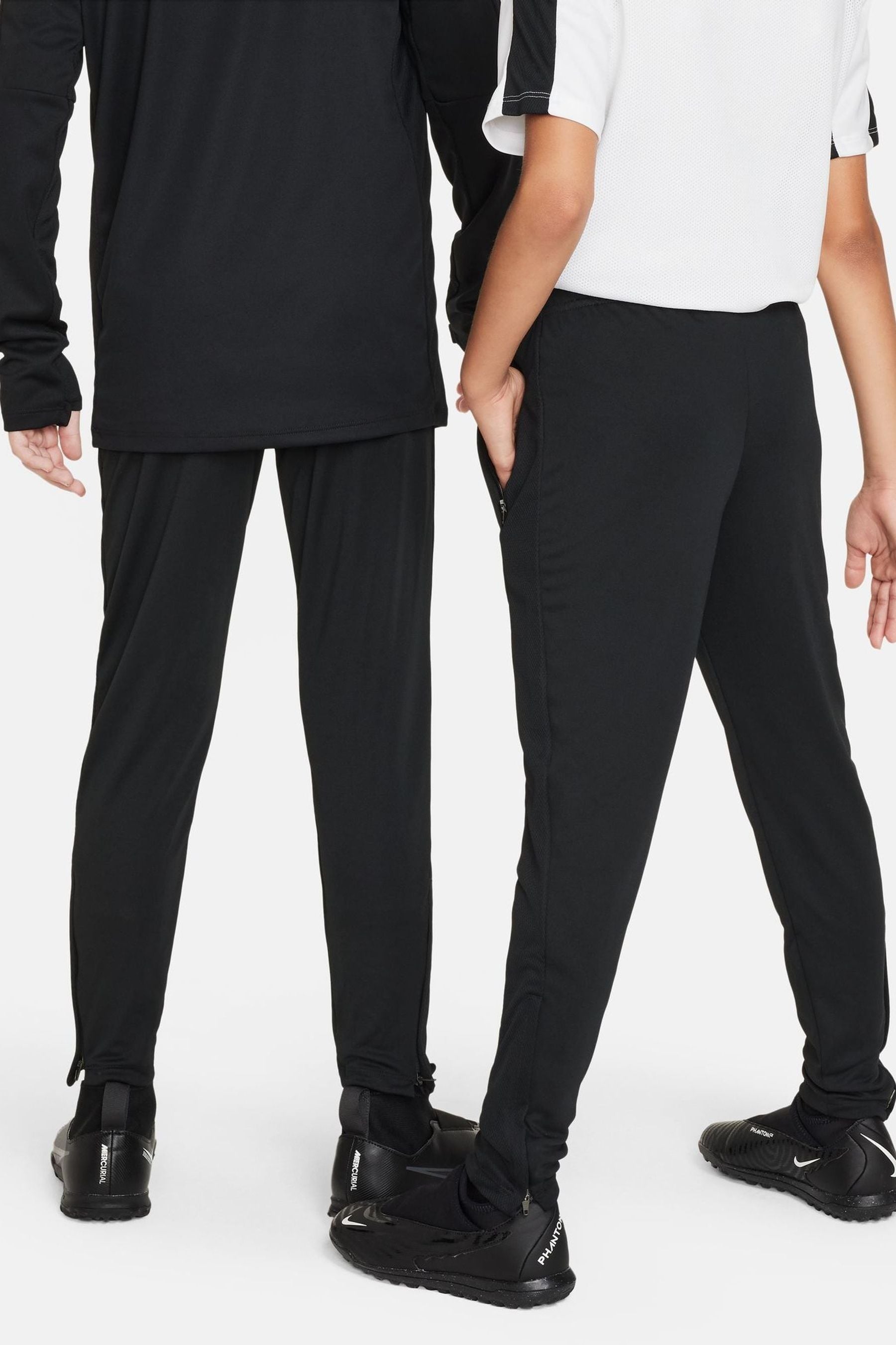 Nike black gold joggers discount