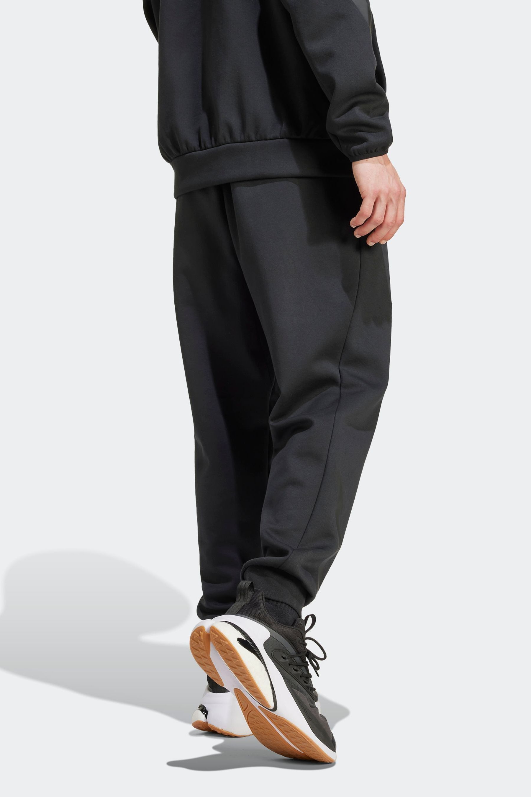 Buy adidas Black Z.N.E. Tracksuit Bottoms from Next Oman