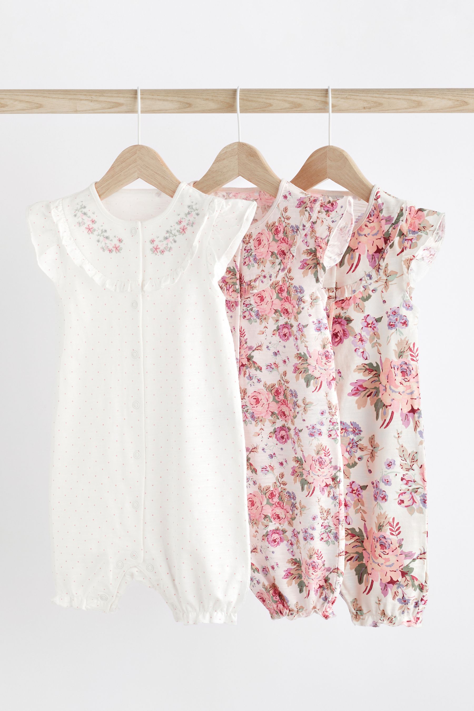 Buy Pink White Floral Baby Rompers 3 Pack from the Next UK online shop