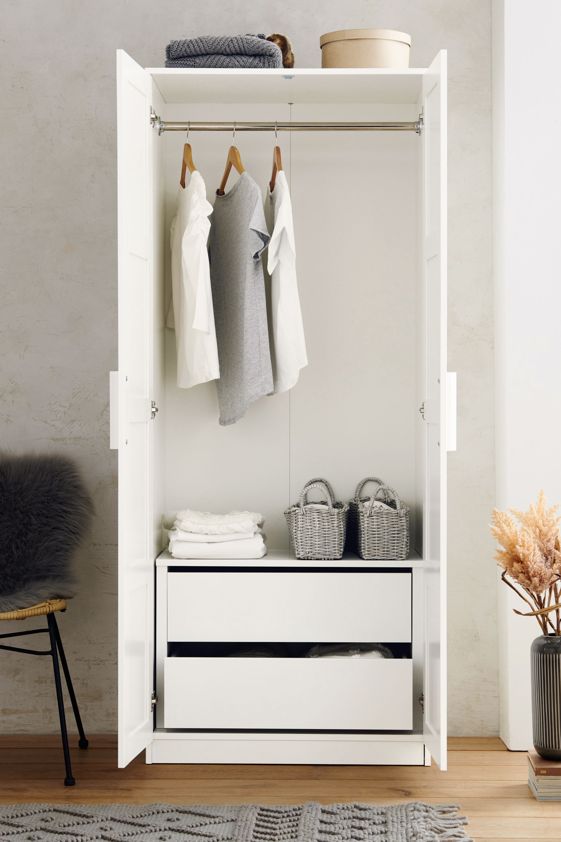Wardrobe with chest store of drawers inside