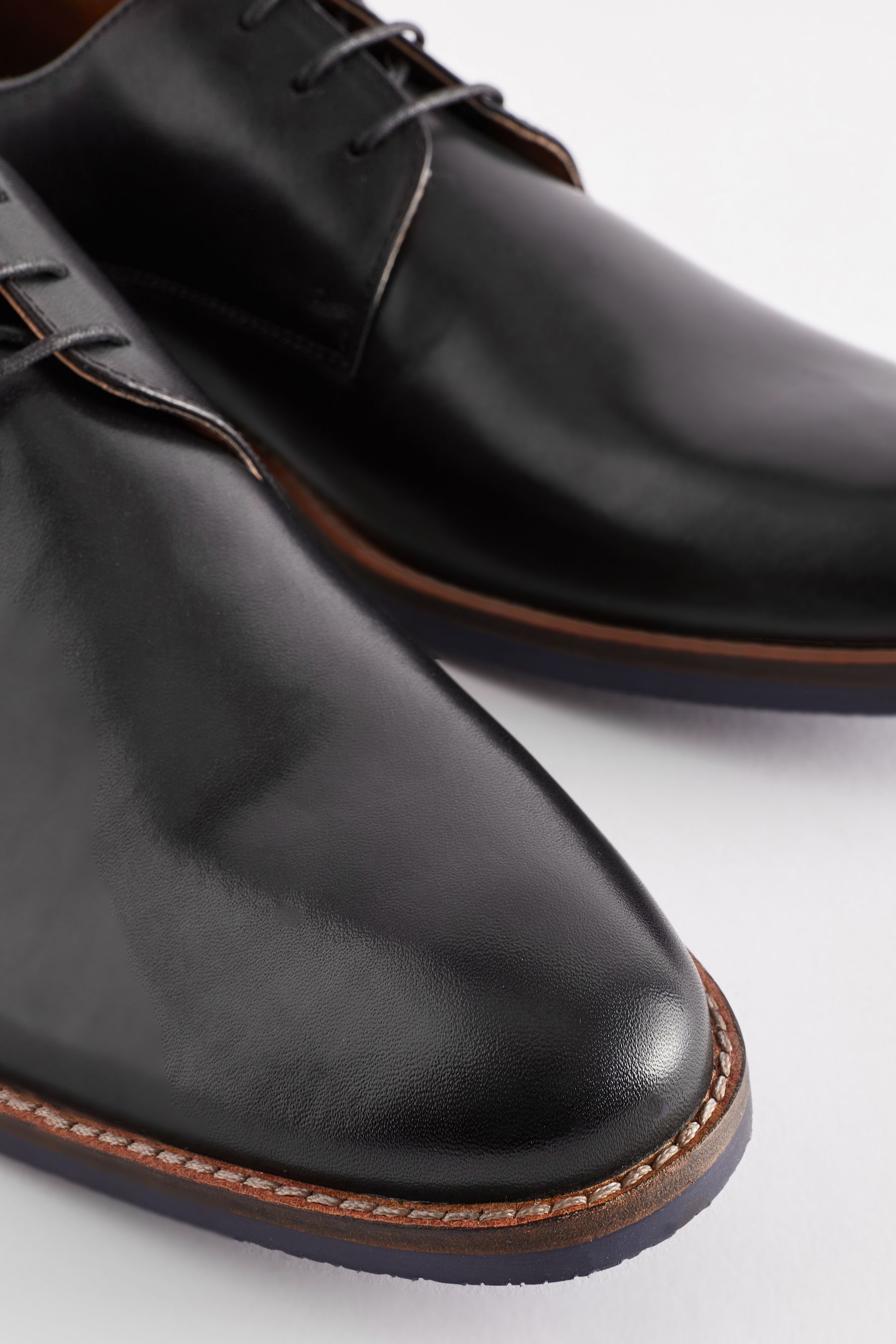 Buy Black Standard Fit Leather Derby Shoes with Navy Contrast Sole from the Next UK online shop