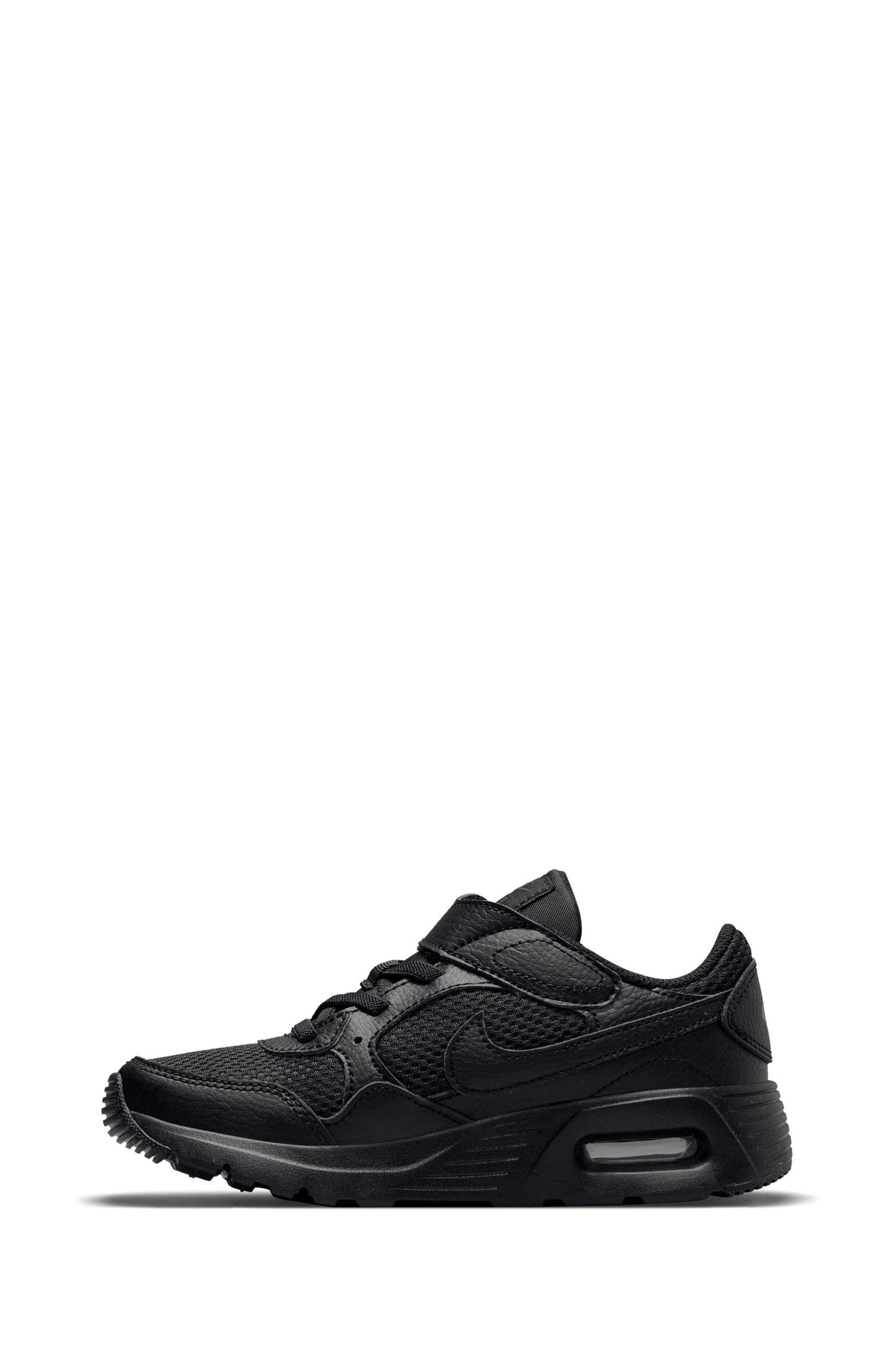 Junior black nike online trainers