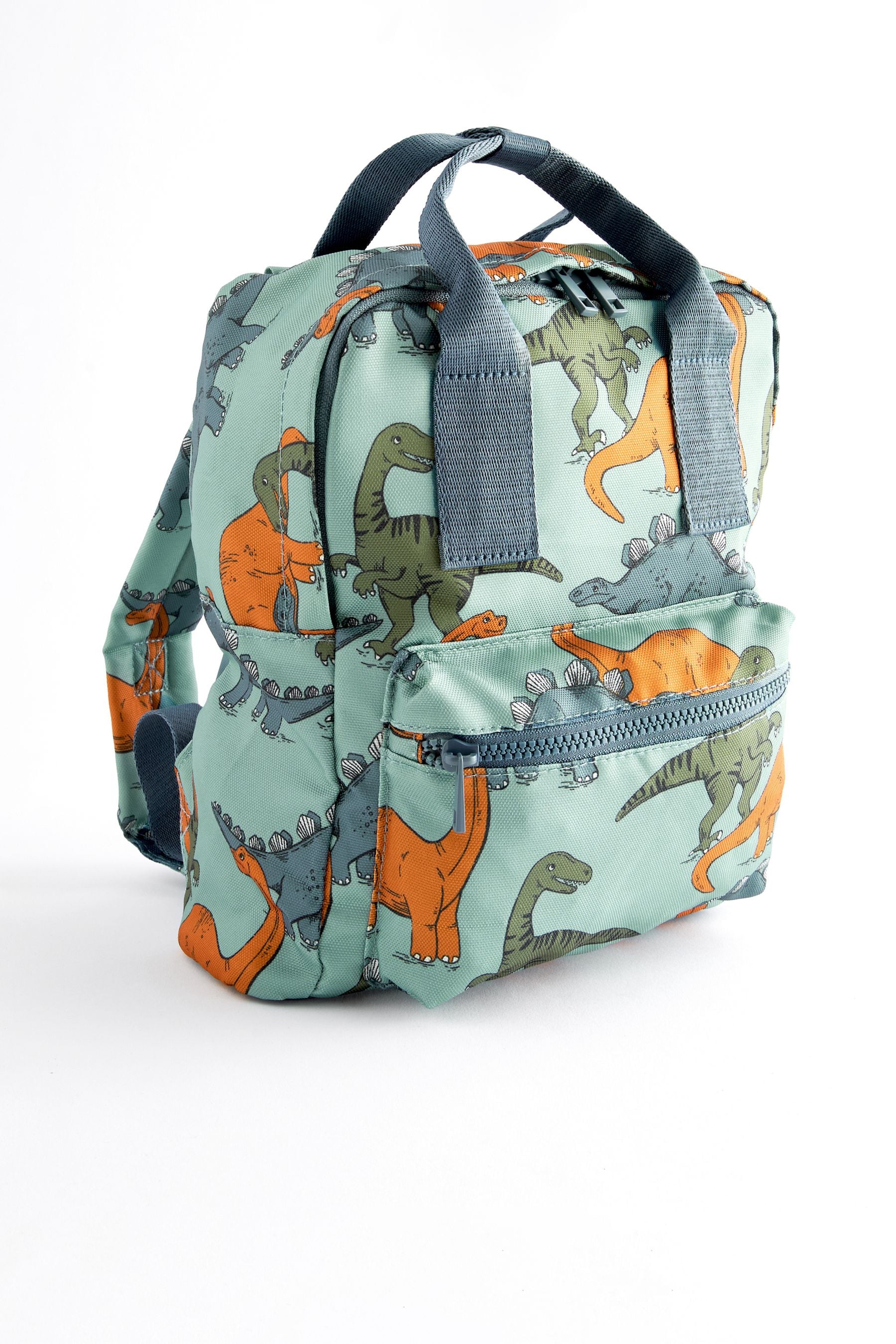 Coach dinosaur backpack top