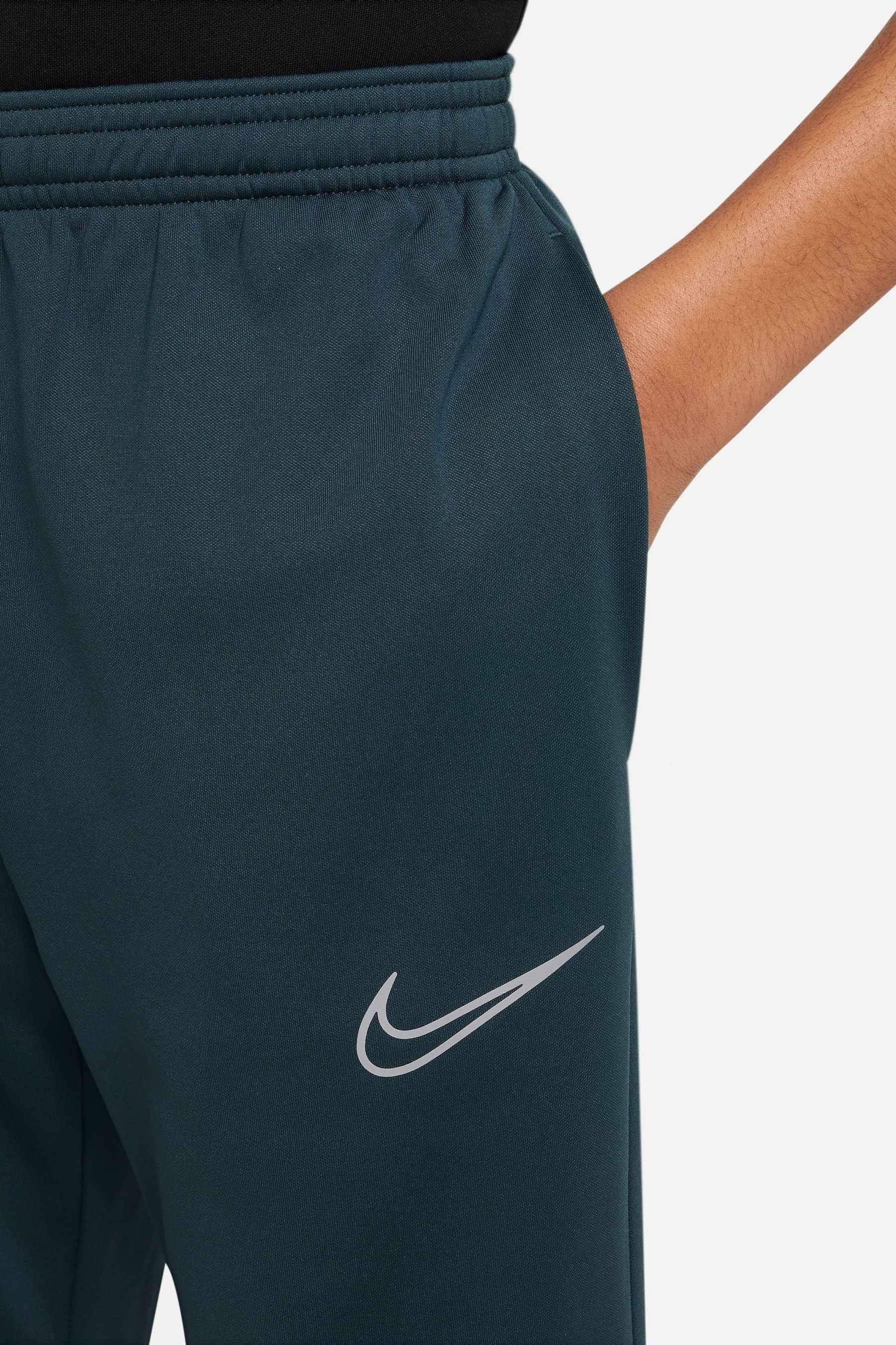 Dark green nike on sale joggers