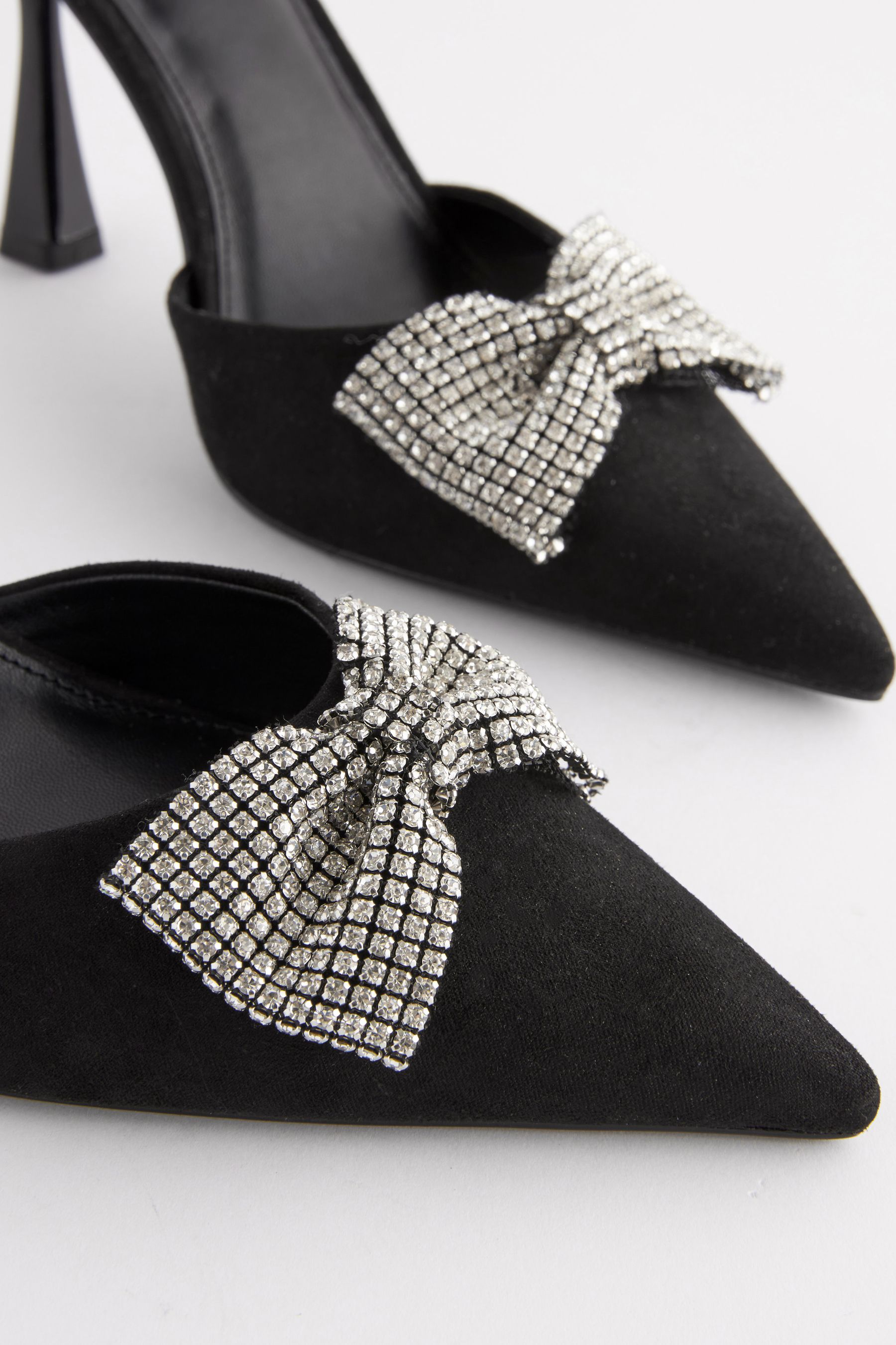 Black bow mules top