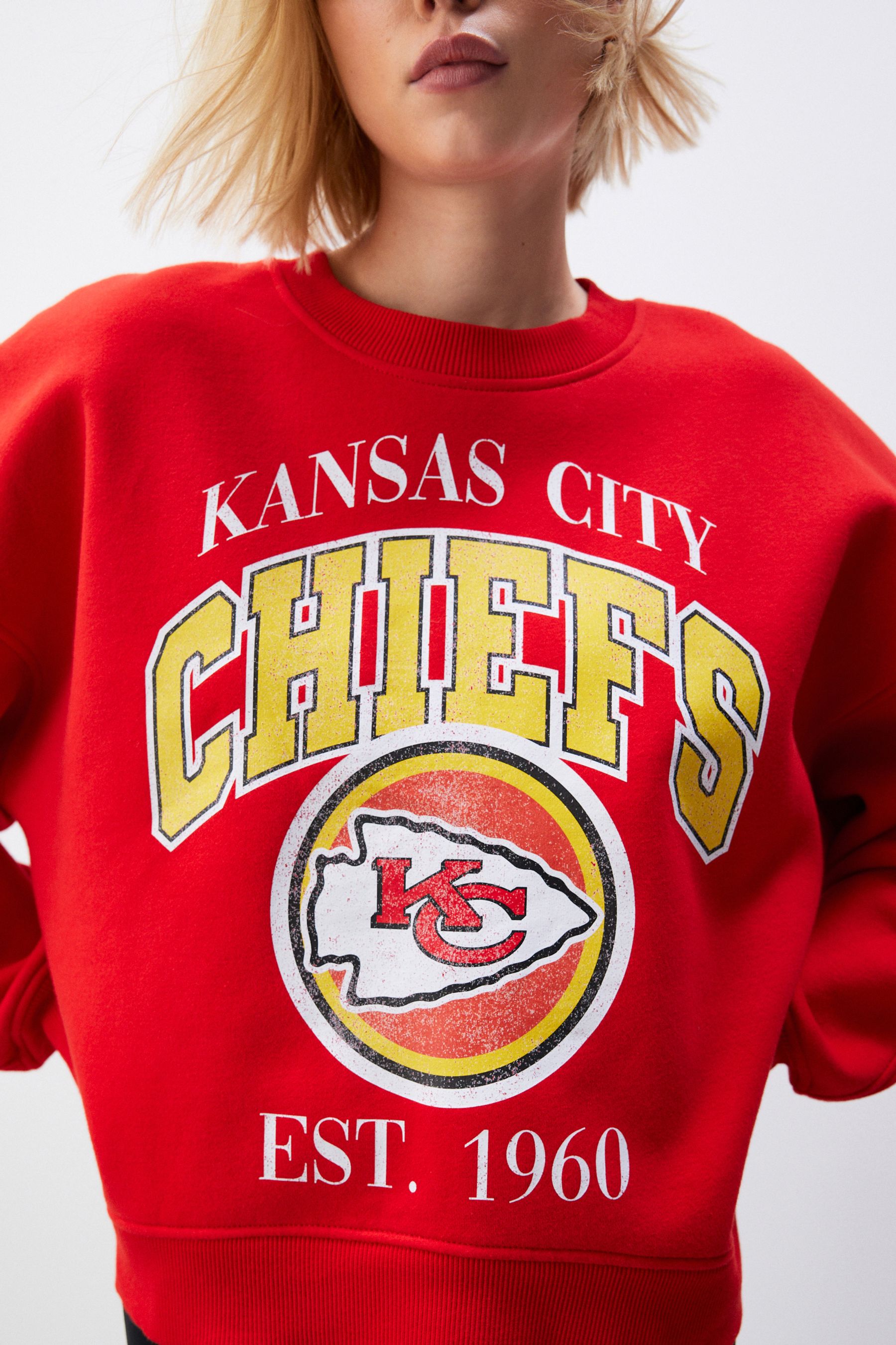 Buy Red NFL American License Kansas City Chiefs Heavyweight Graphic Slogan 100 Cottton Sweatshirt from Next Luxembourg
