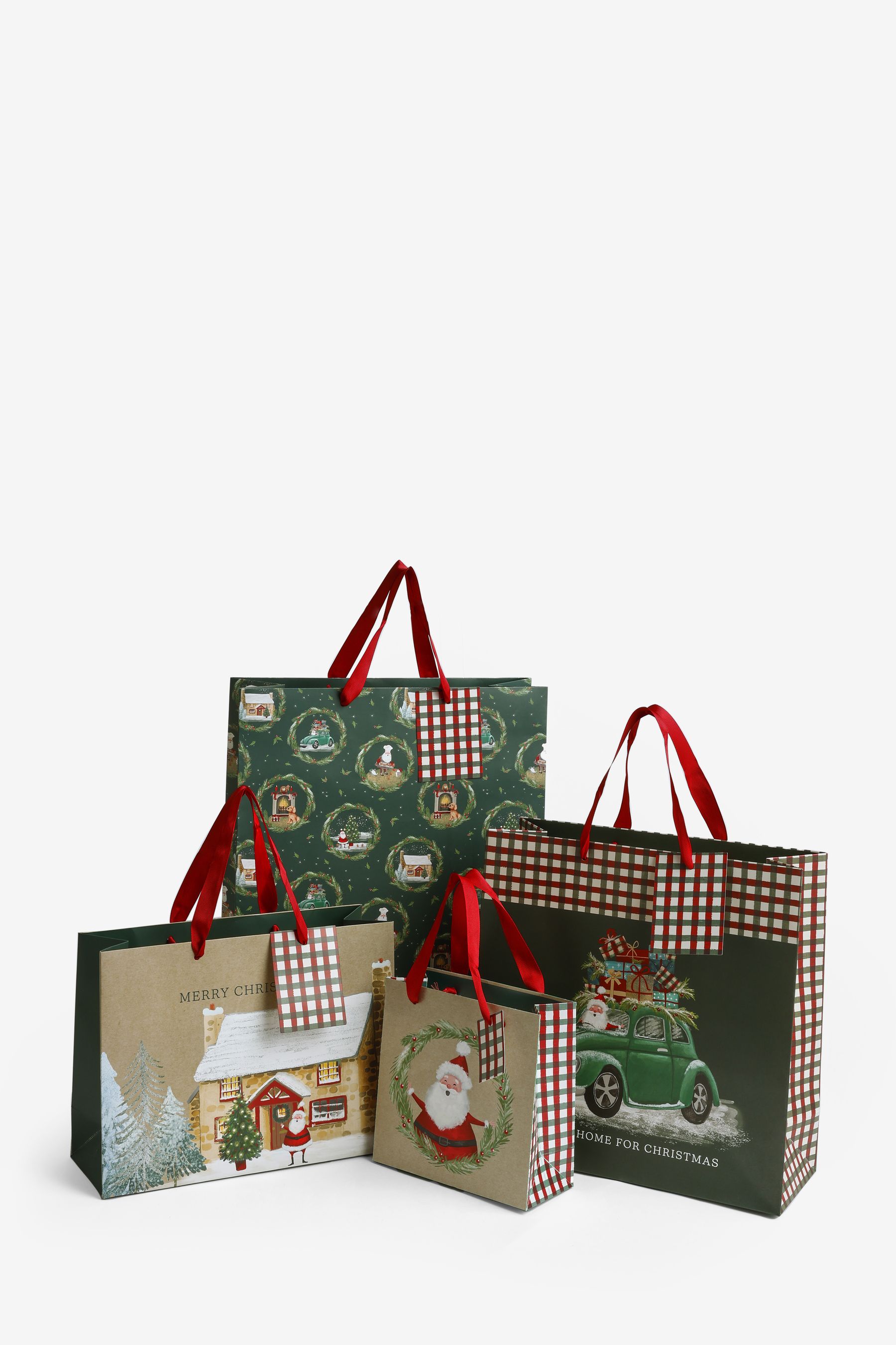 Buy Santa Scene Christmas 4 Pack Gift Bags from the Next UK online shop