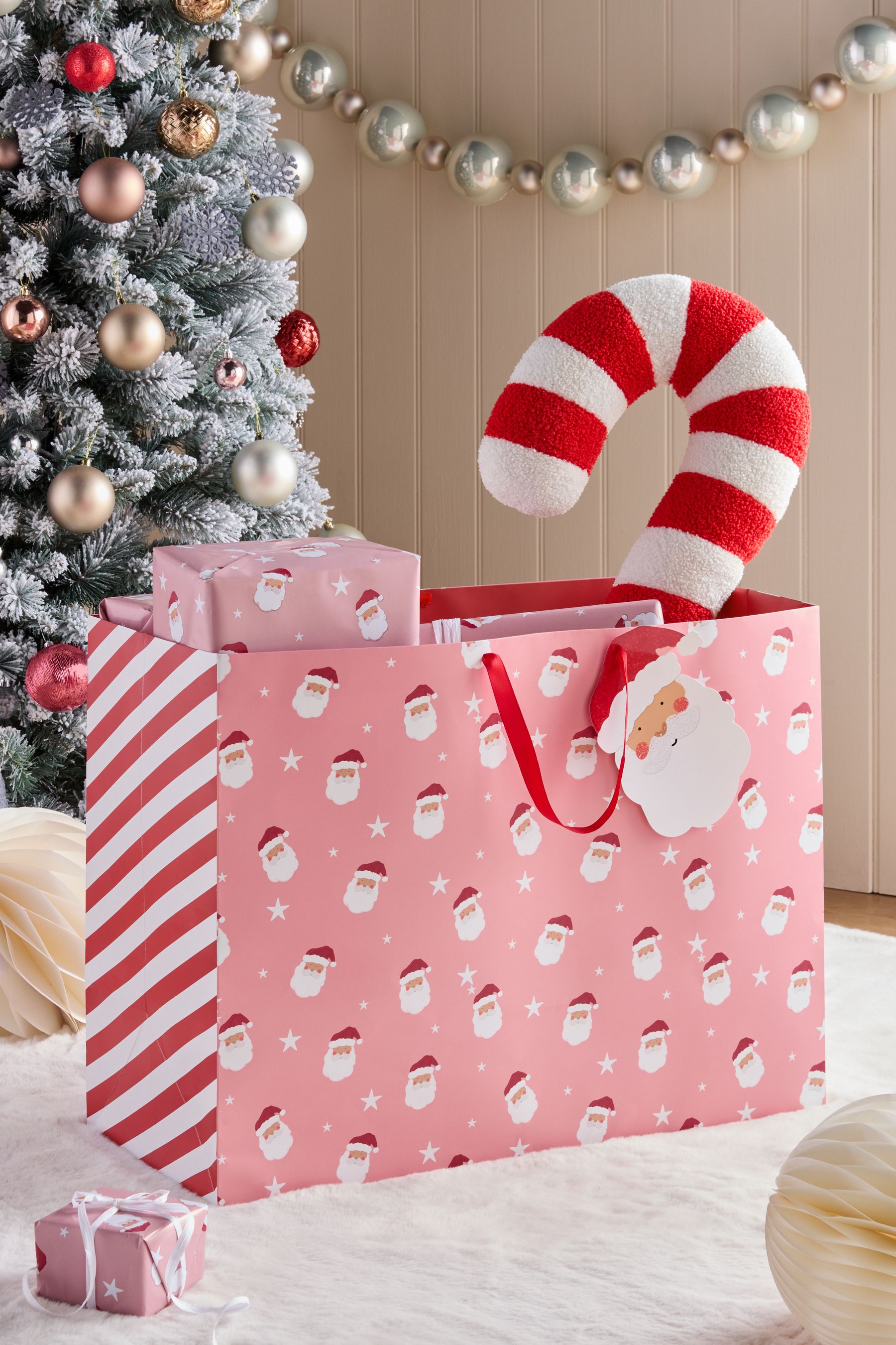 Buy Pink Santa Christmas Large Gift Bags from the Next UK online shop