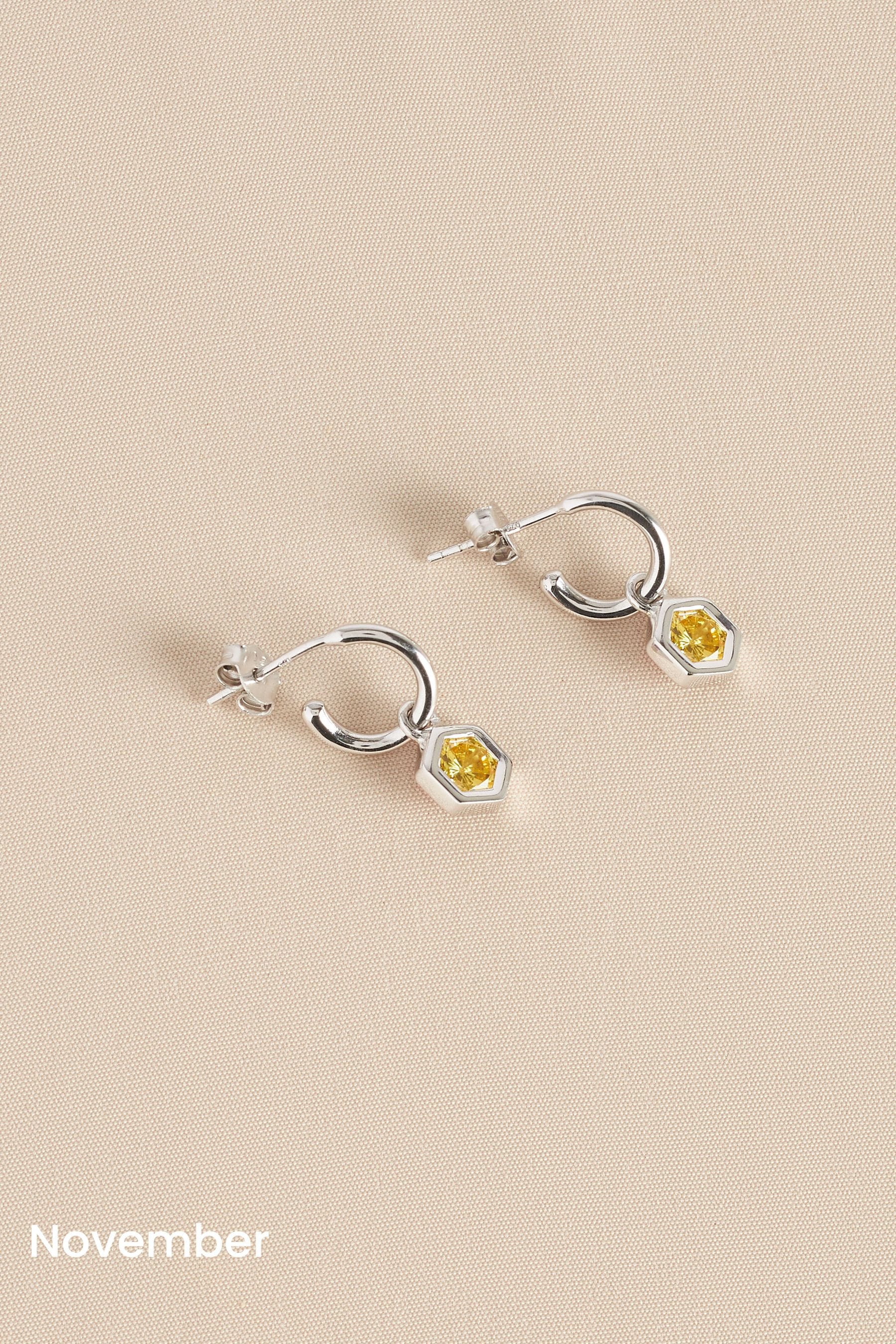 Buy Sterling Silver Hexagon Birthstone Hoop Earrings from the Next UK online shop